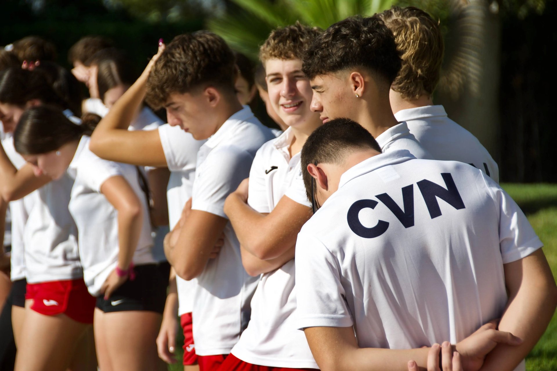 an abstract photo of a curved building with a blue sky in the background