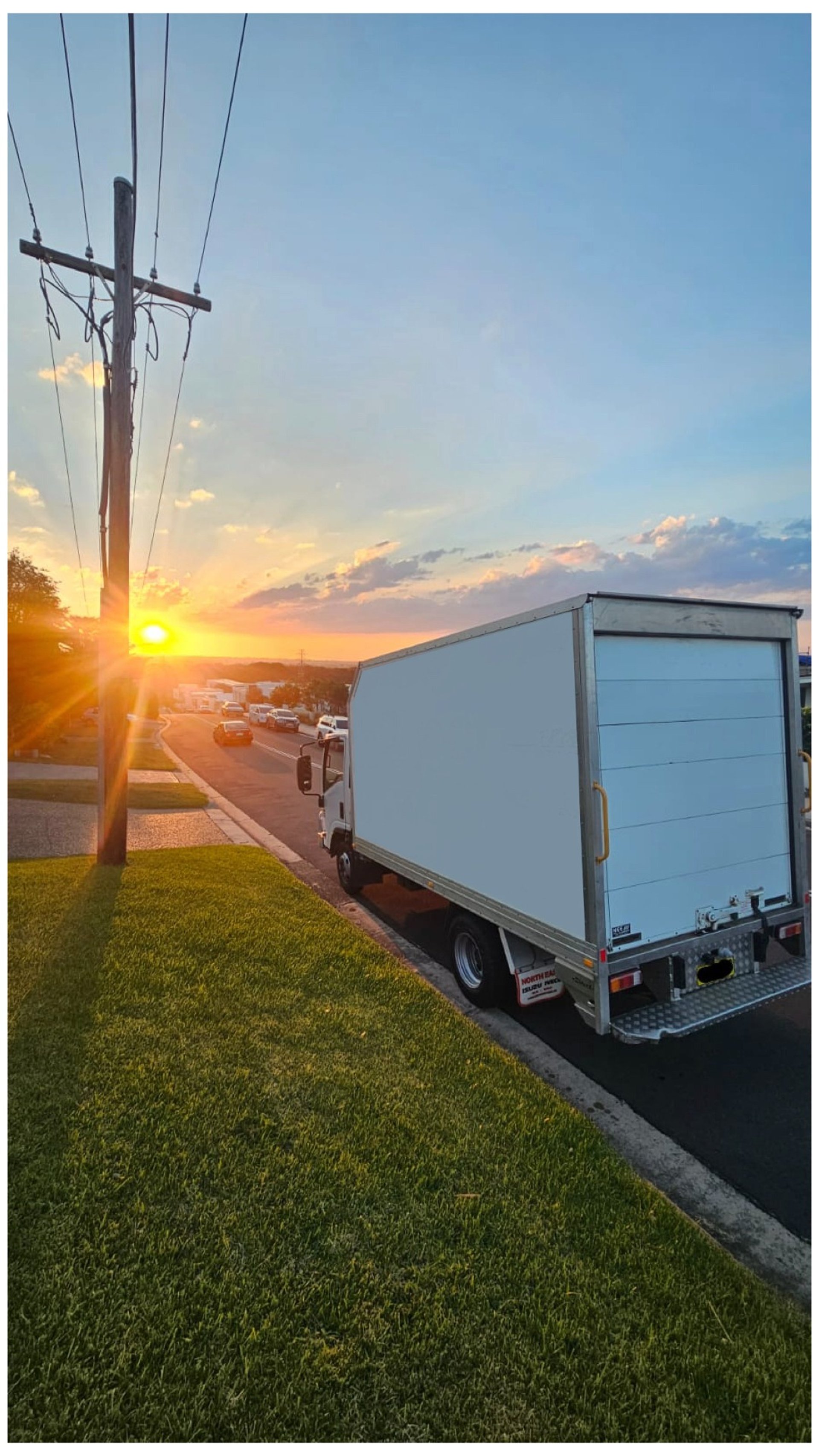 an abstract photo of a curved building with a blue sky in the background