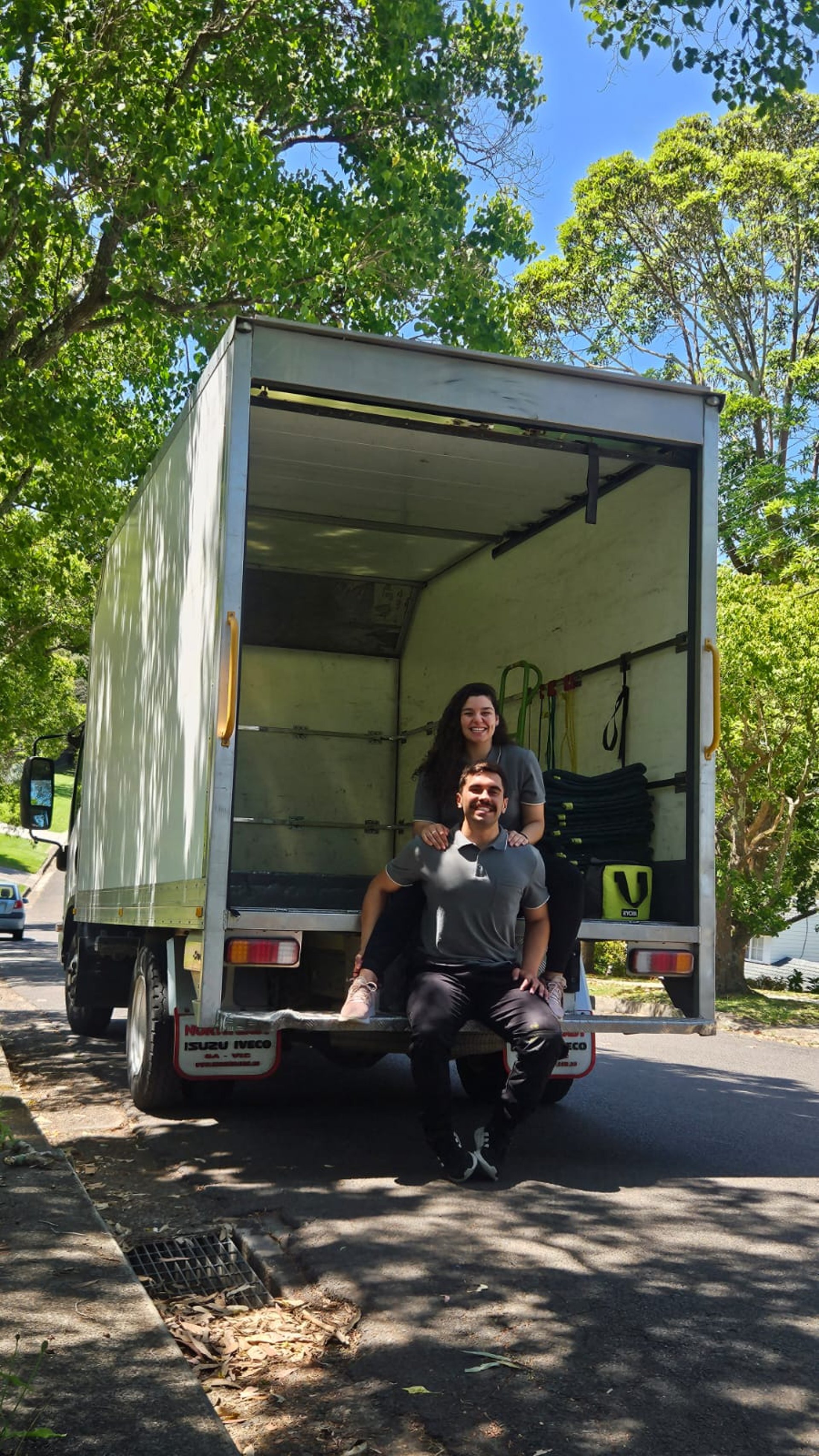 black and brown leather padded tub sofa