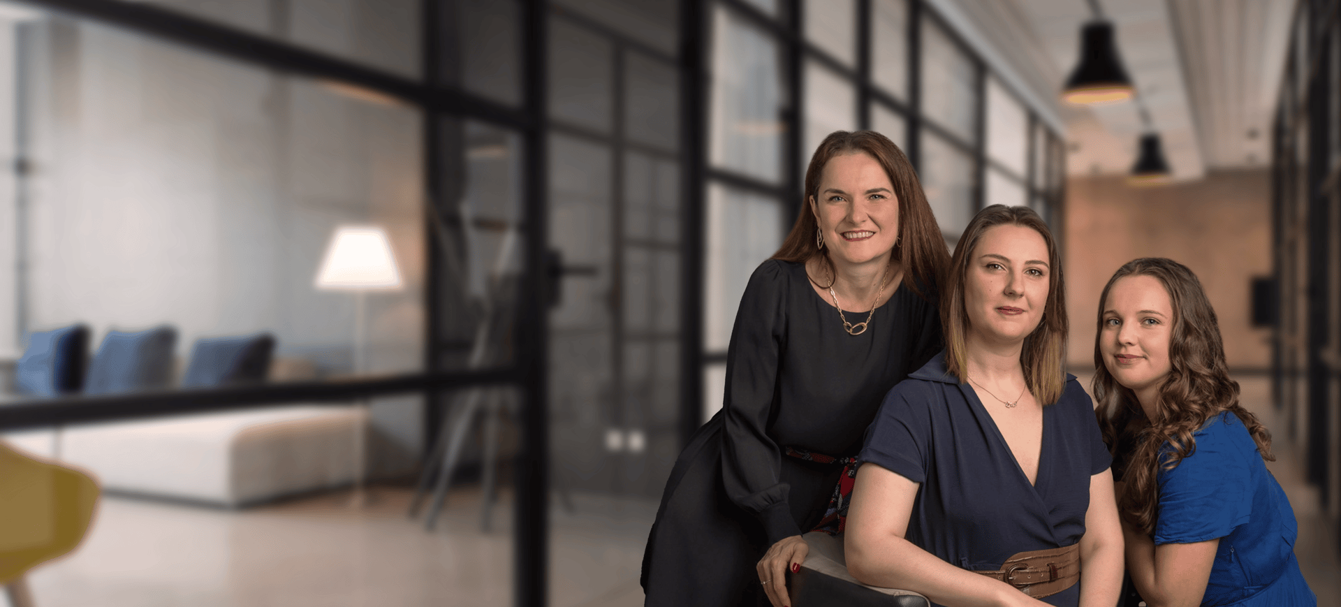 an abstract photo of a curved building with a blue sky in the background