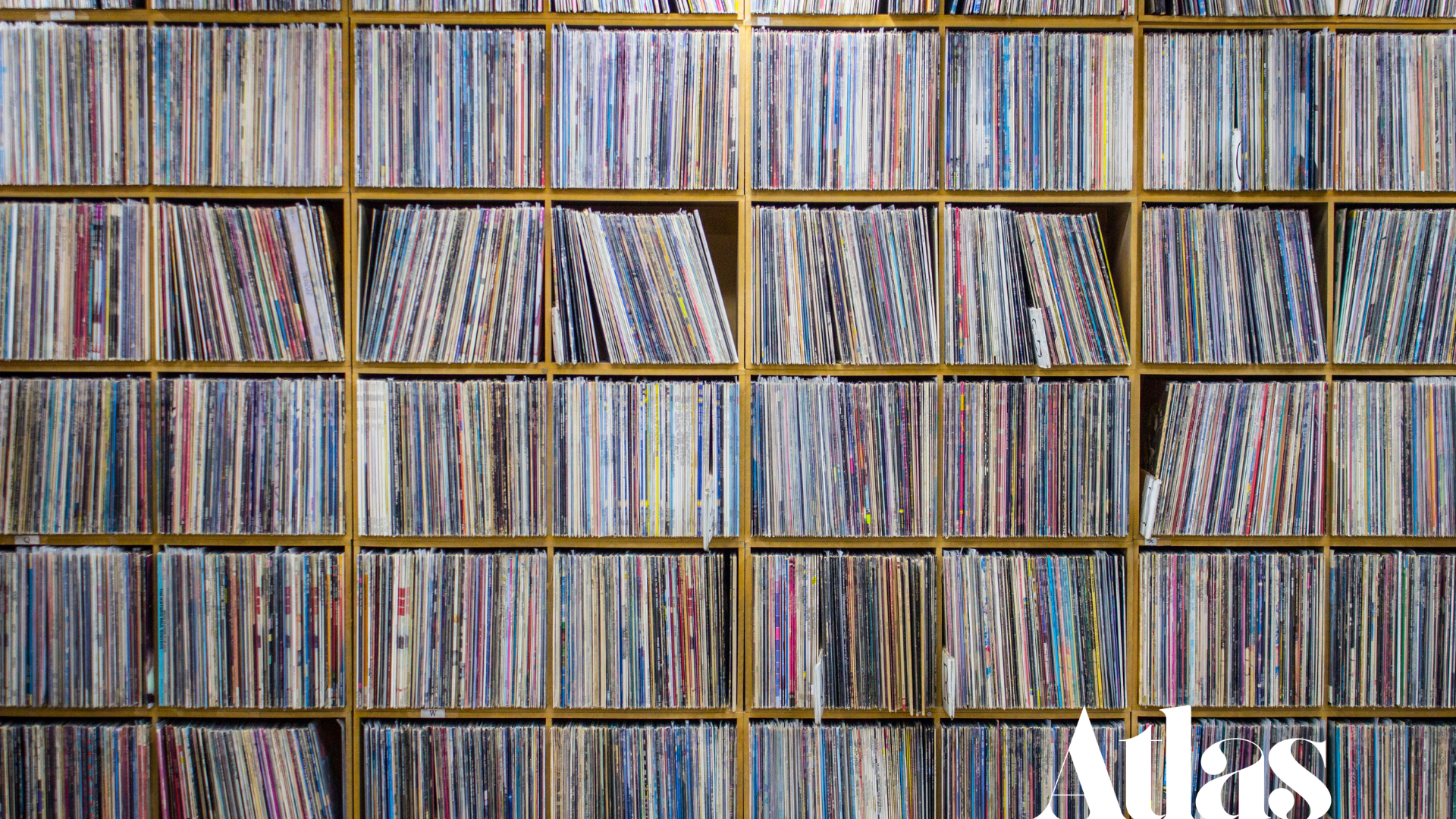 a pile of old cassettes sitting on top of a table