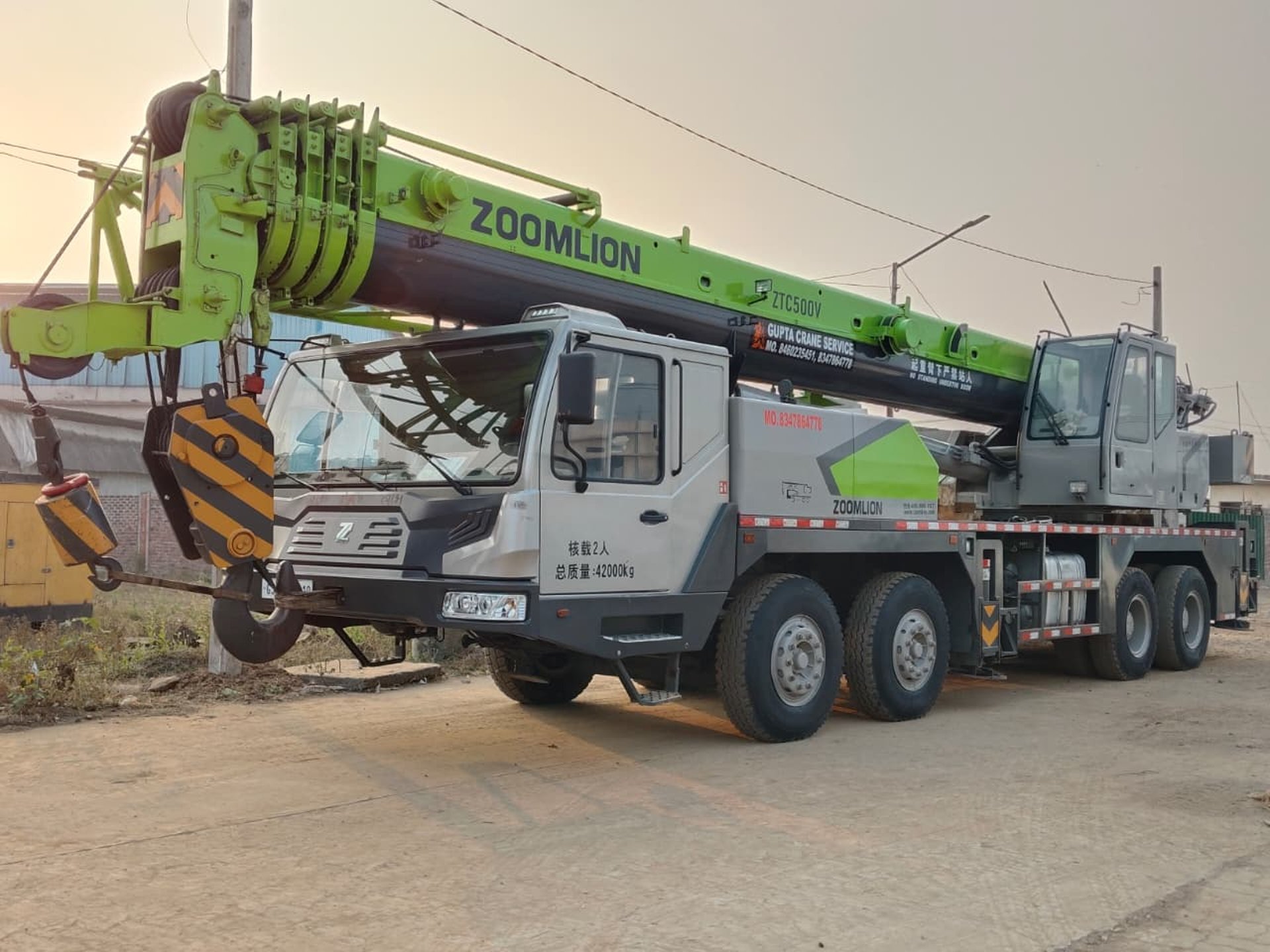 black and brown leather padded tub sofa