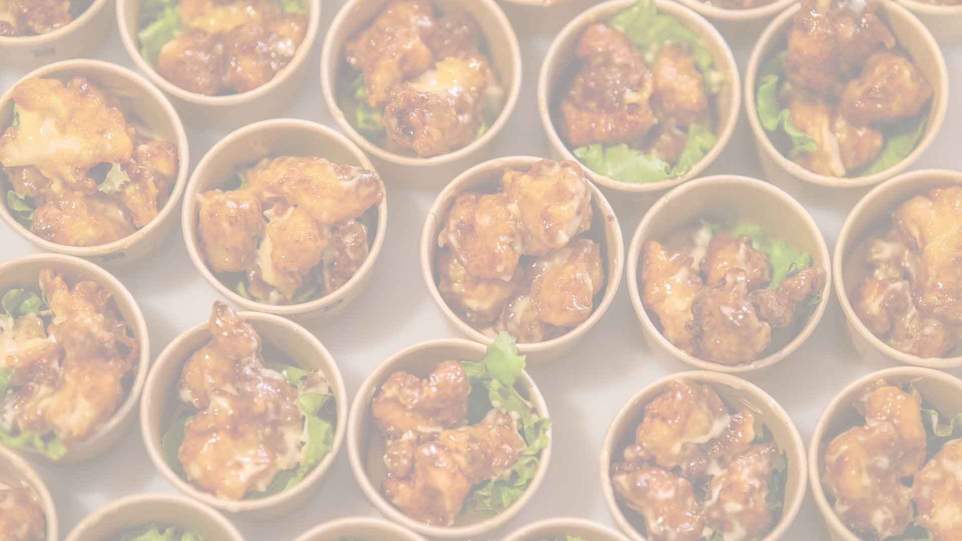 an abstract photo of a curved building with a blue sky in the background