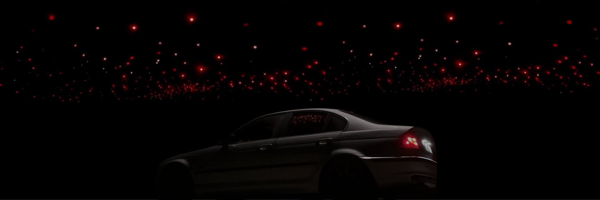 an abstract photo of a curved building with a blue sky in the background