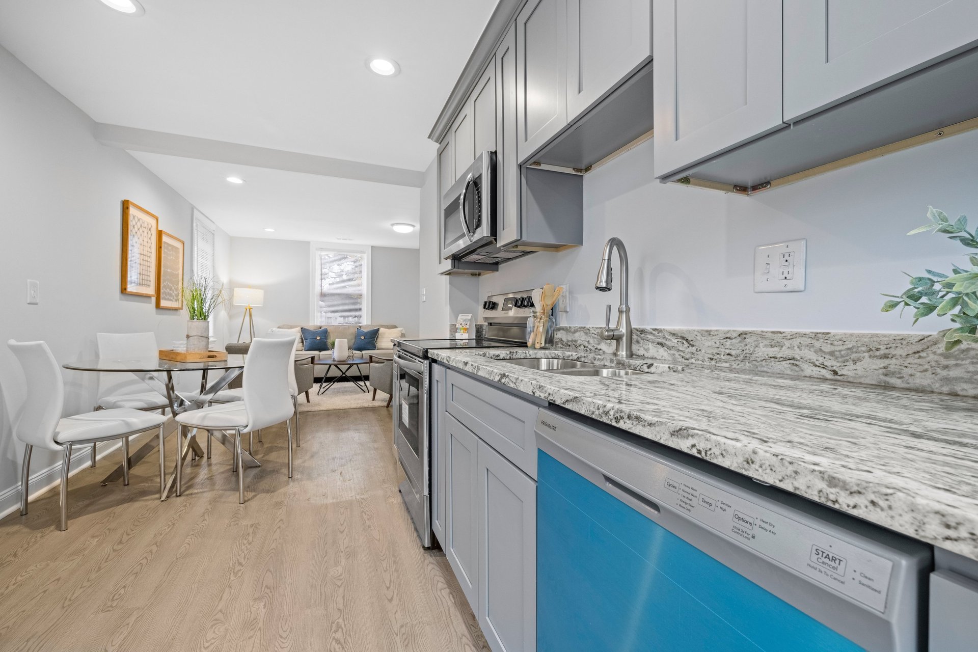 an abstract photo of a curved building with a blue sky in the background