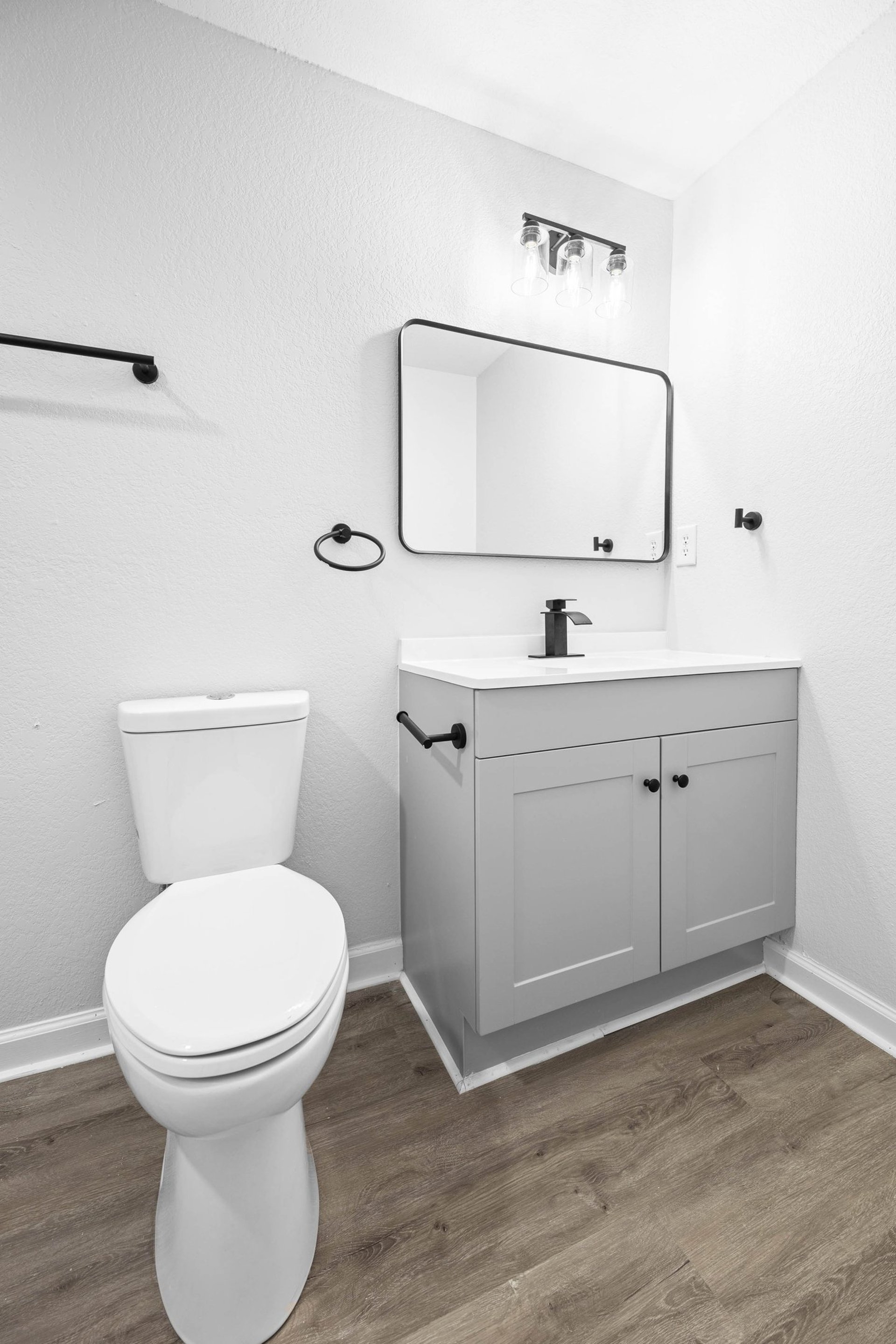 an abstract photo of a curved building with a blue sky in the background