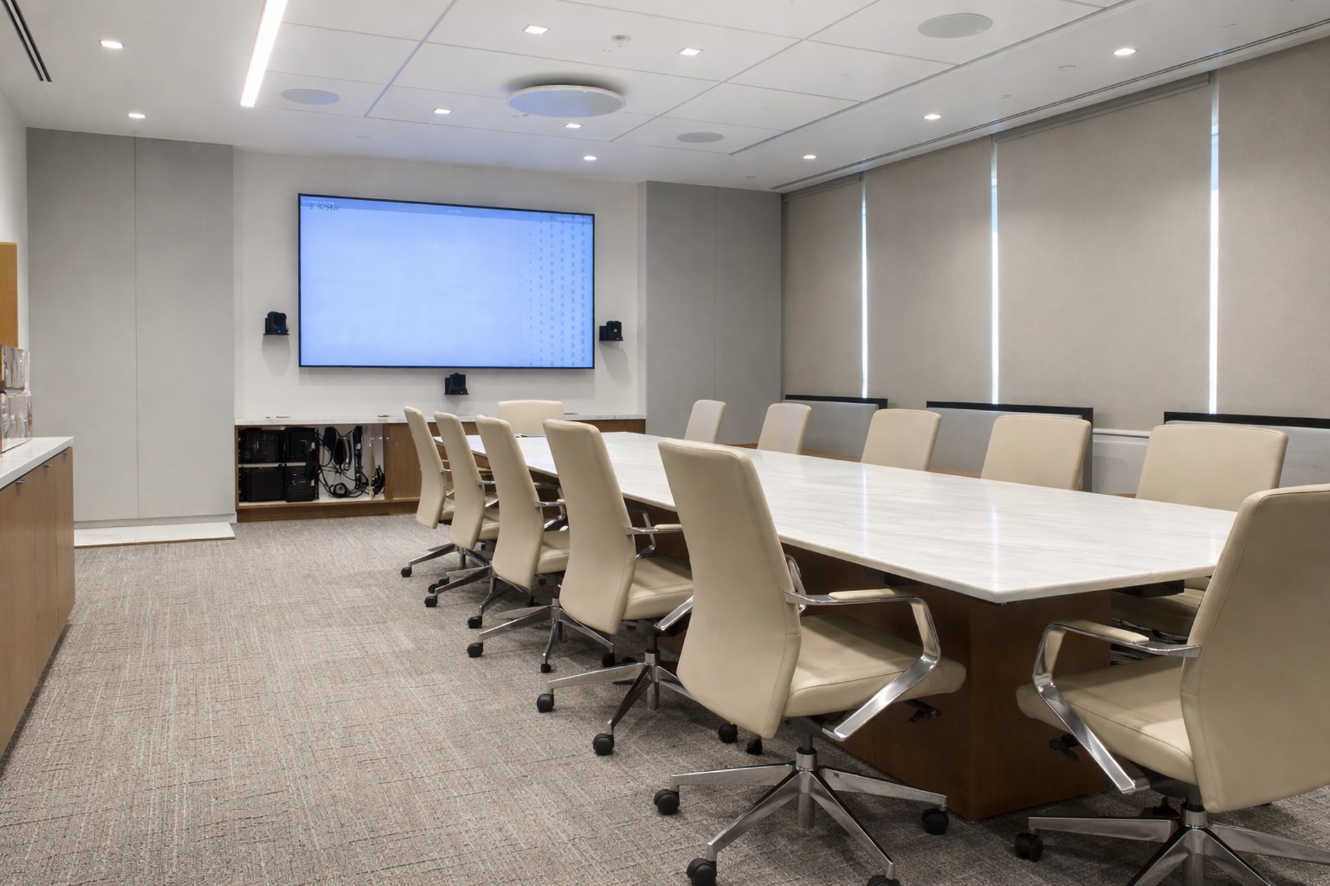 an abstract photo of a curved building with a blue sky in the background
