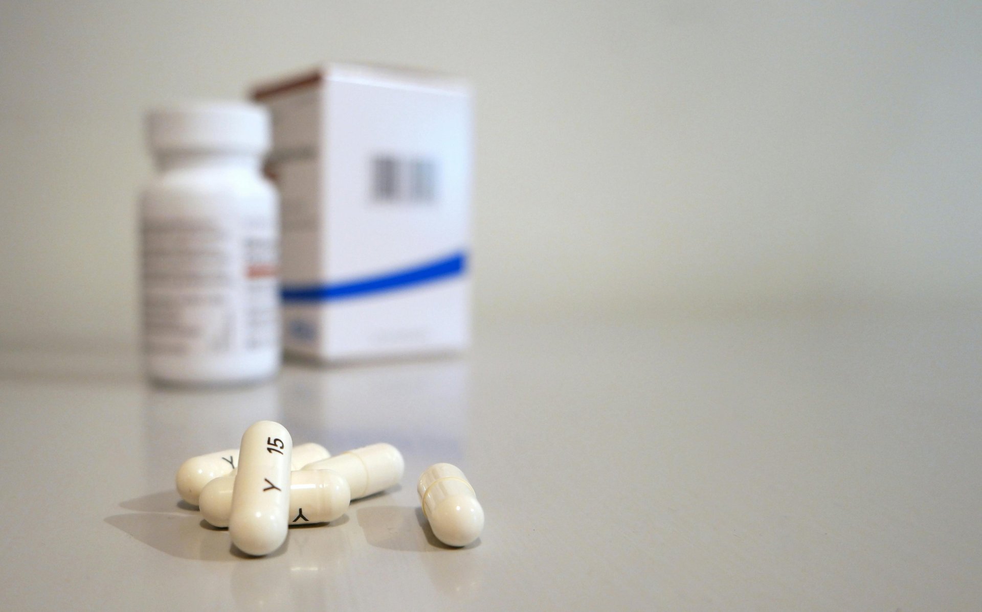 white medication capsules