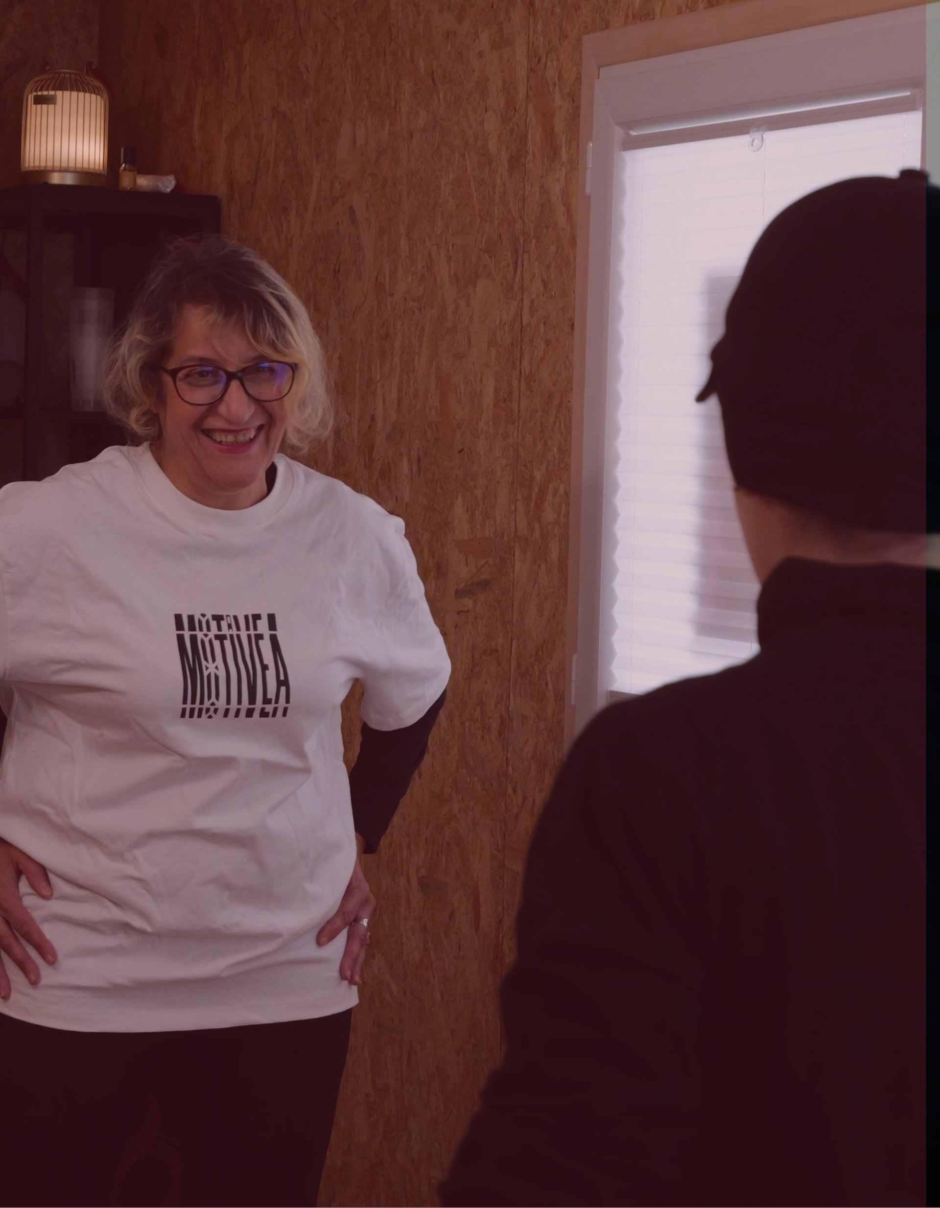 three women kneeling inside building at daytime