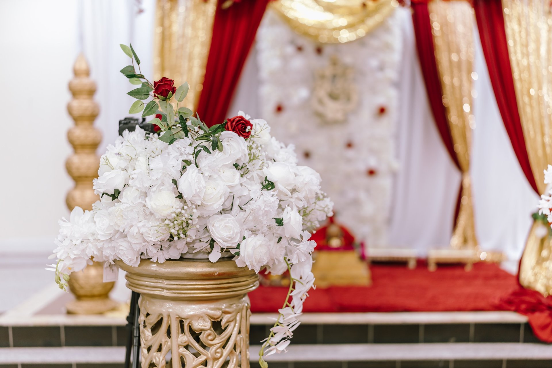 red and white umbrella on white table