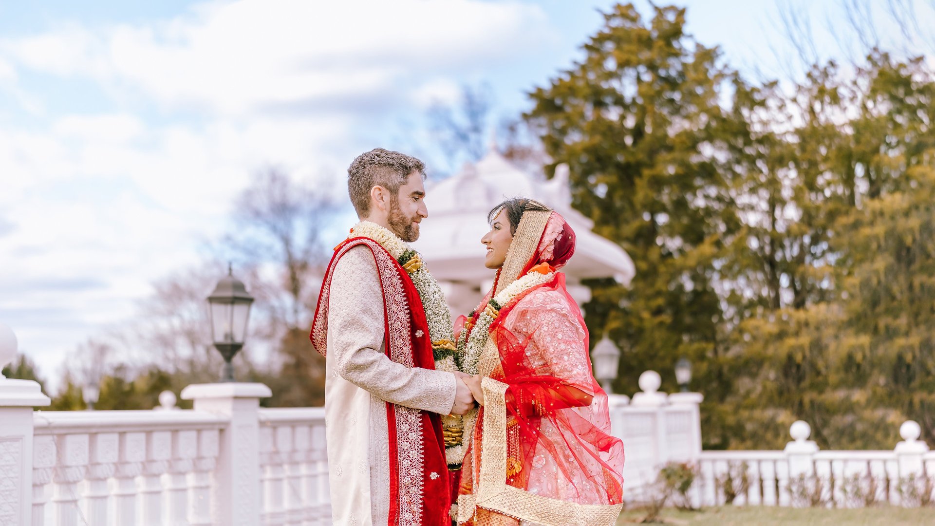 Girl's portrait on a rock near the lake on a sunny day