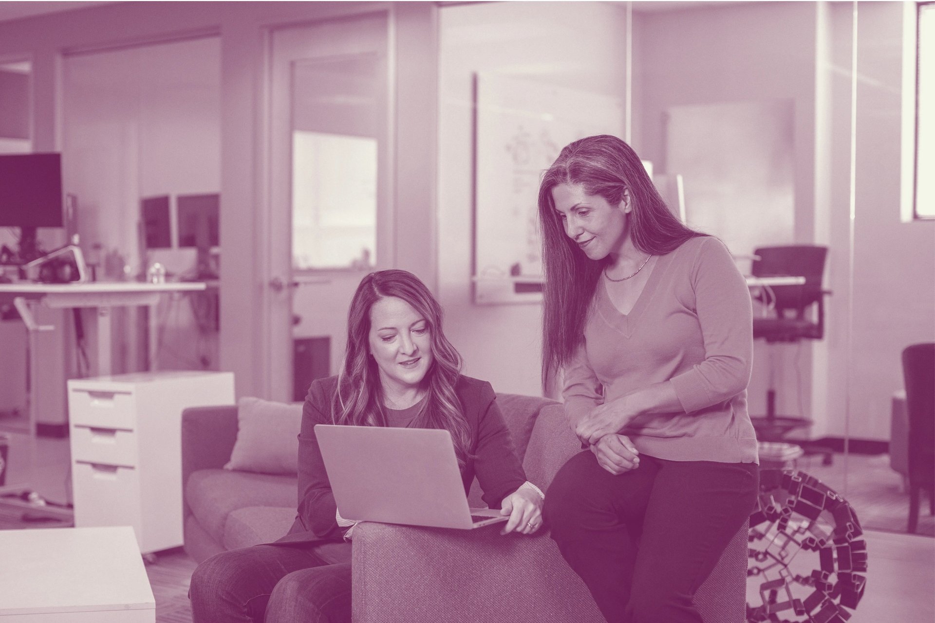 Two women engaged in a coaching session