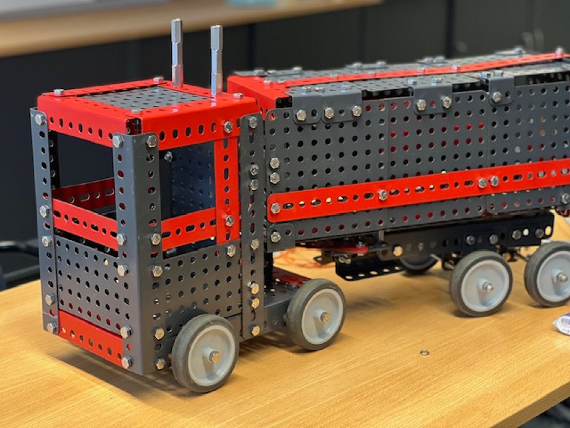 black and brown leather padded tub sofa