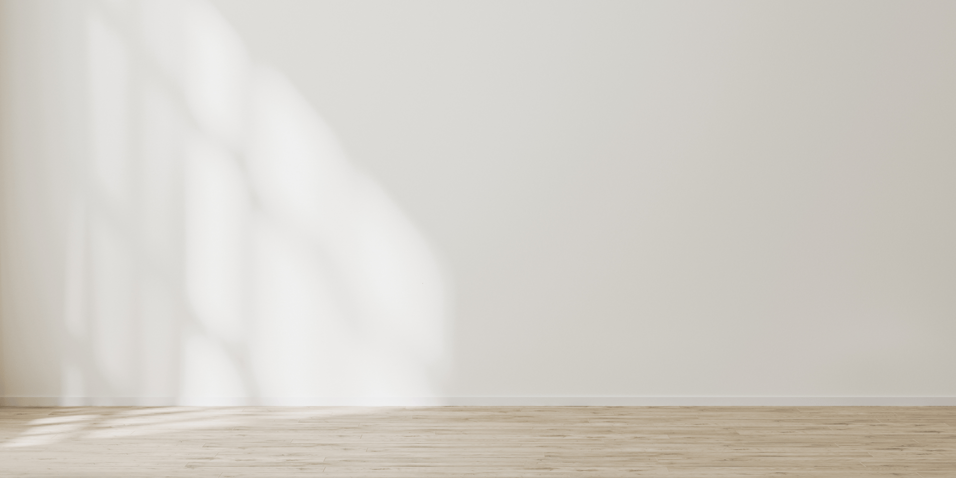 woman walking beside white painted wall