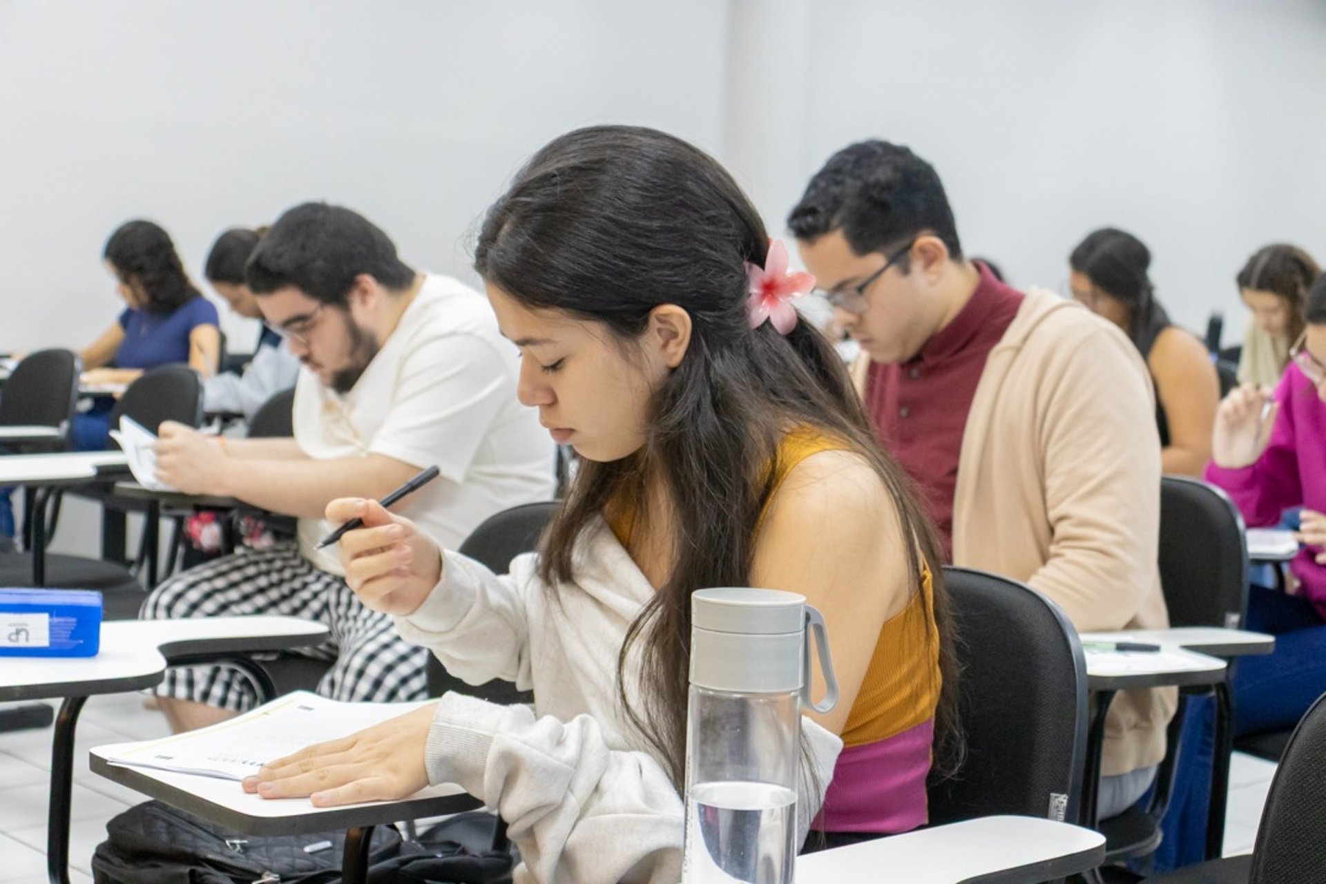 woman wearing yellow long-sleeved dress under white clouds and blue sky during daytime