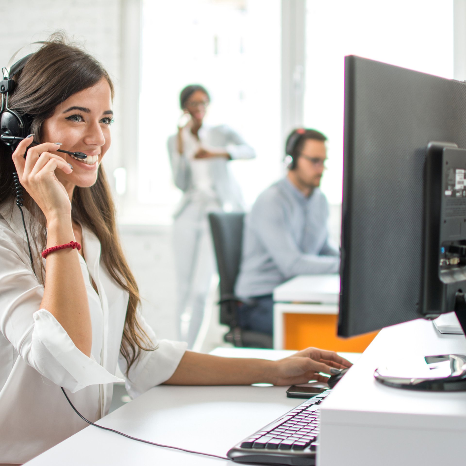 woman wearing yellow long-sleeved dress under white clouds and blue sky during daytime