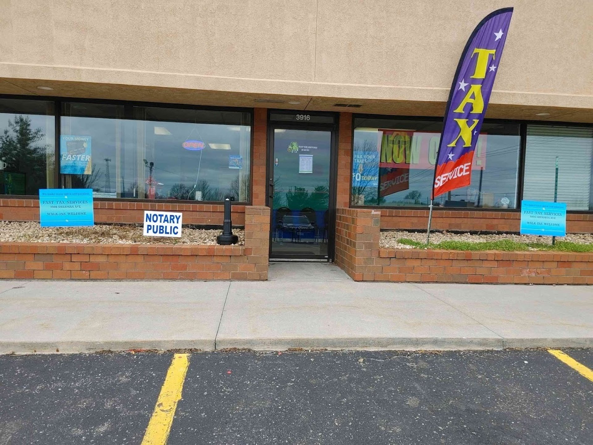 white and black boat on body of water near city buildings during daytime