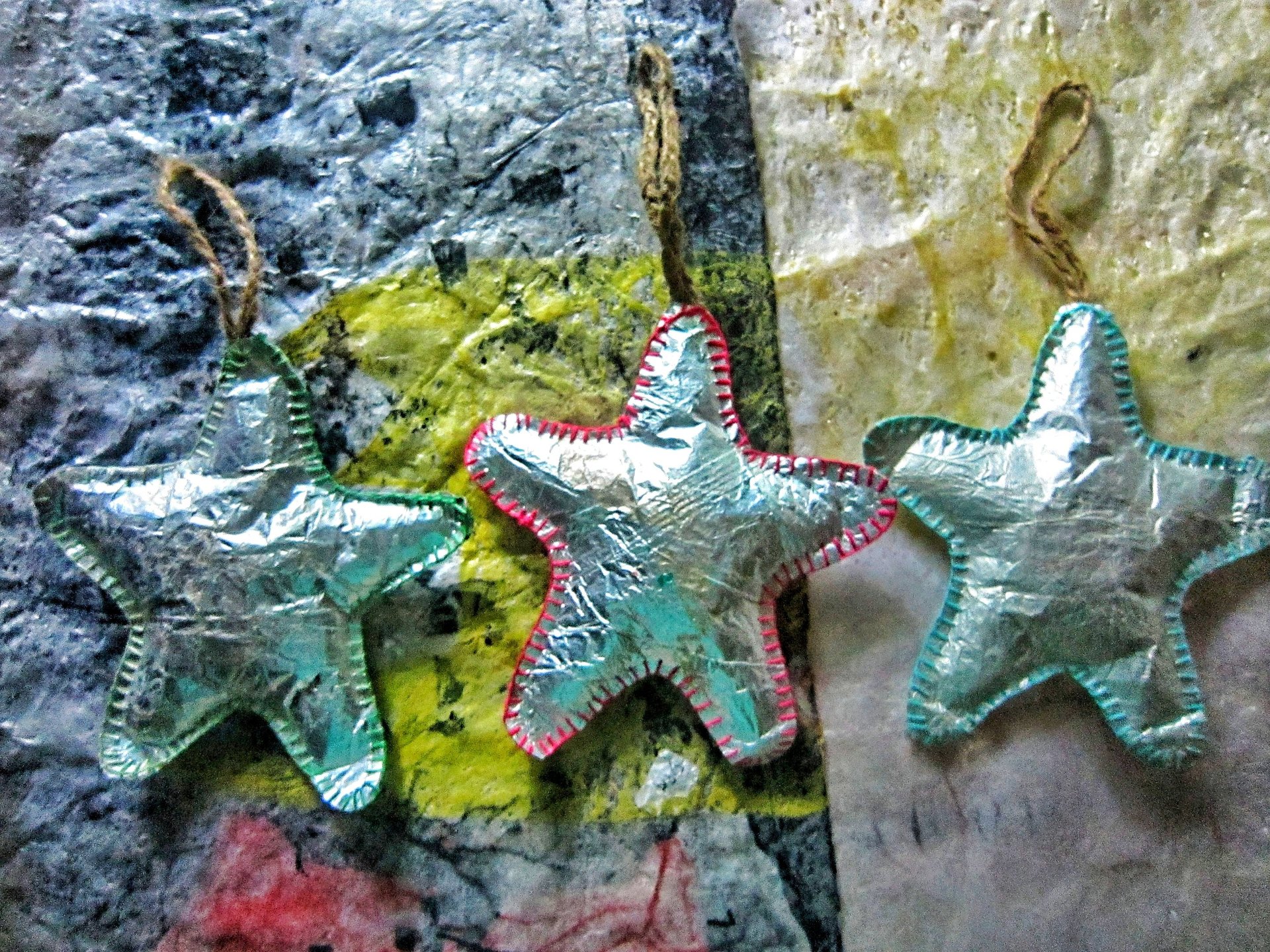 Placed a row silver star ornament from recycled plastic handmade sewing 