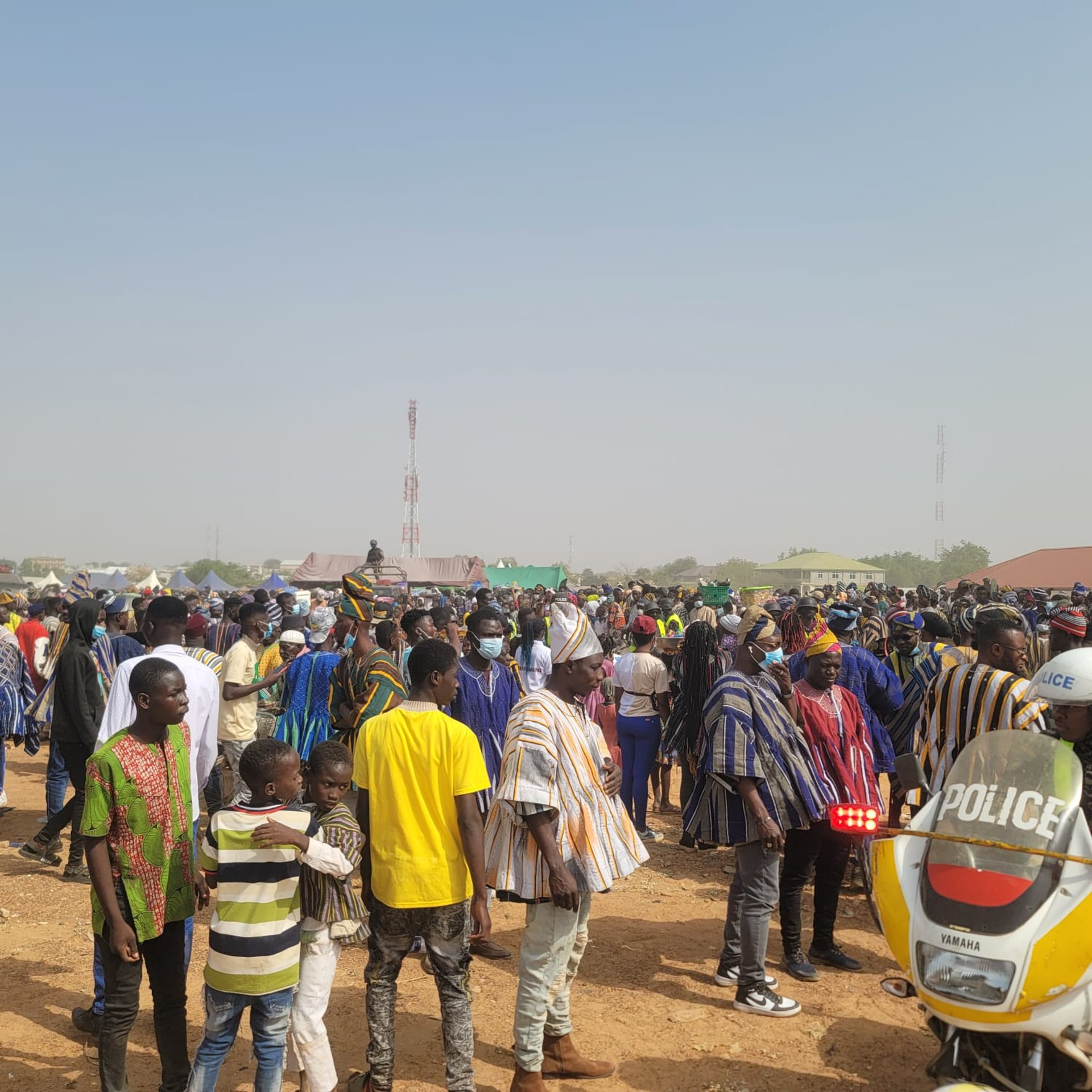 an abstract photo of a curved building with a blue sky in the background