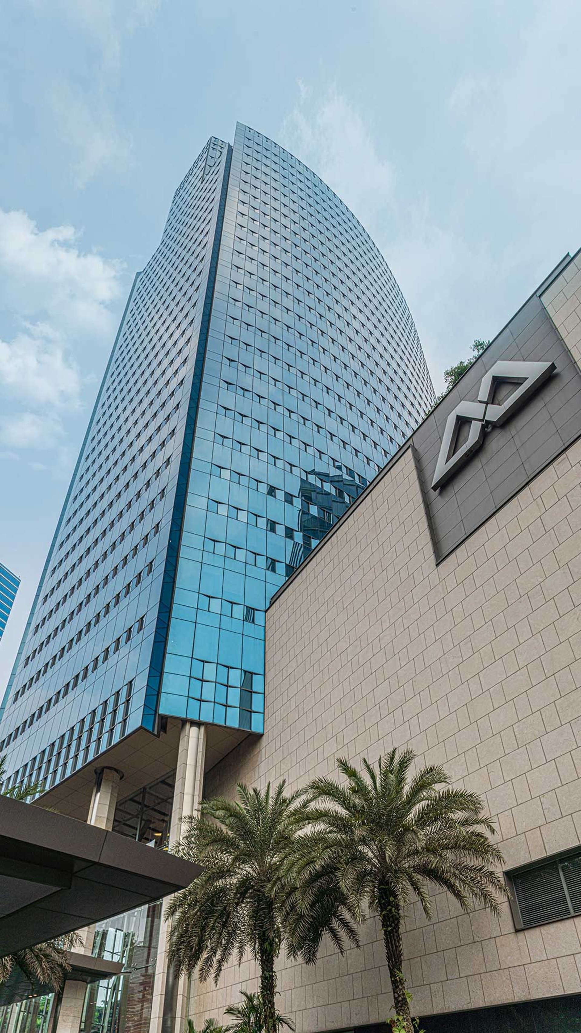 low angle photo of city high rise buildings during daytime