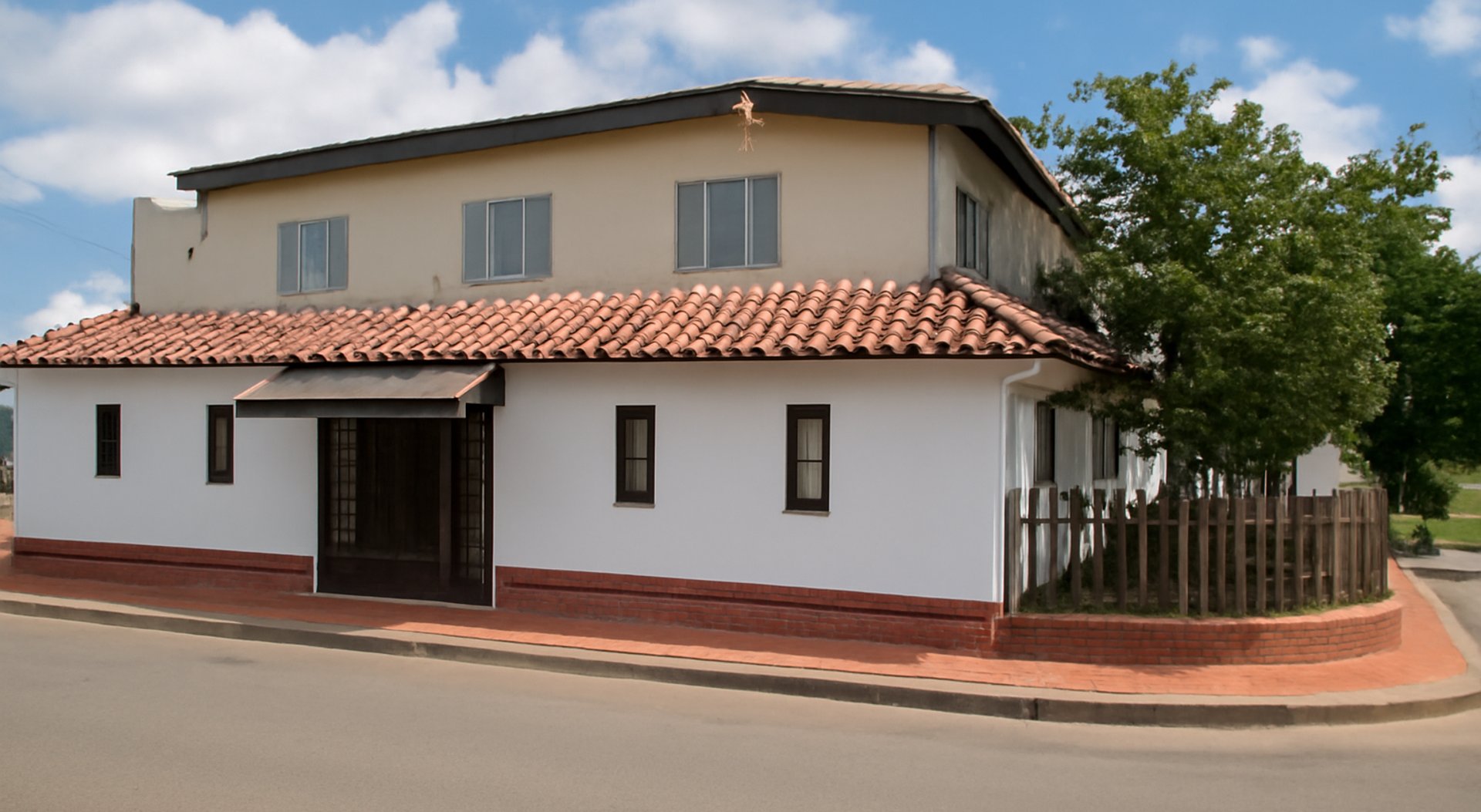 black and brown leather padded tub sofa