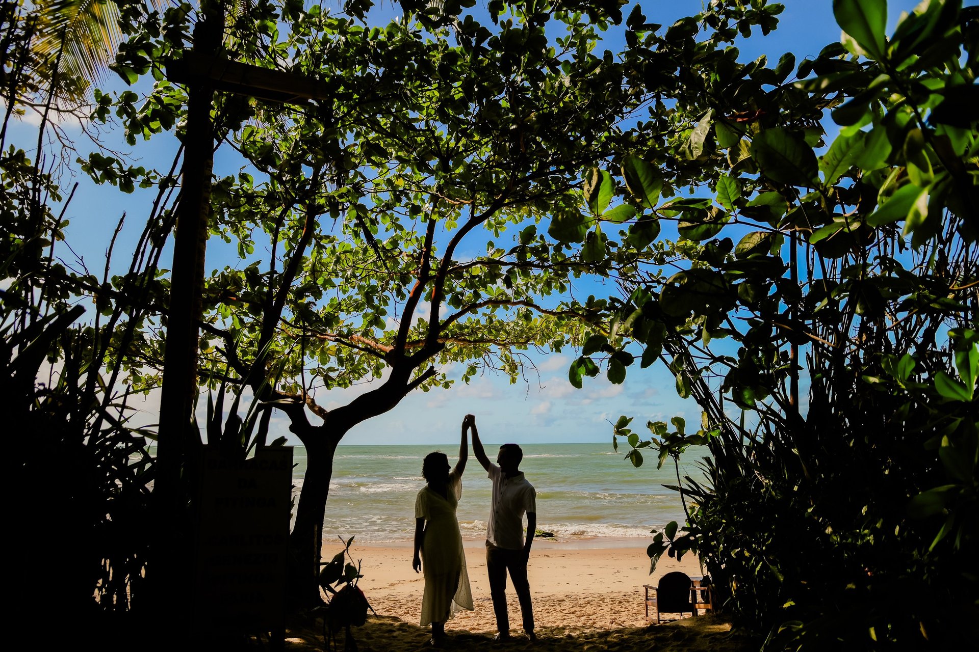 an abstract photo of a curved building with a blue sky in the background