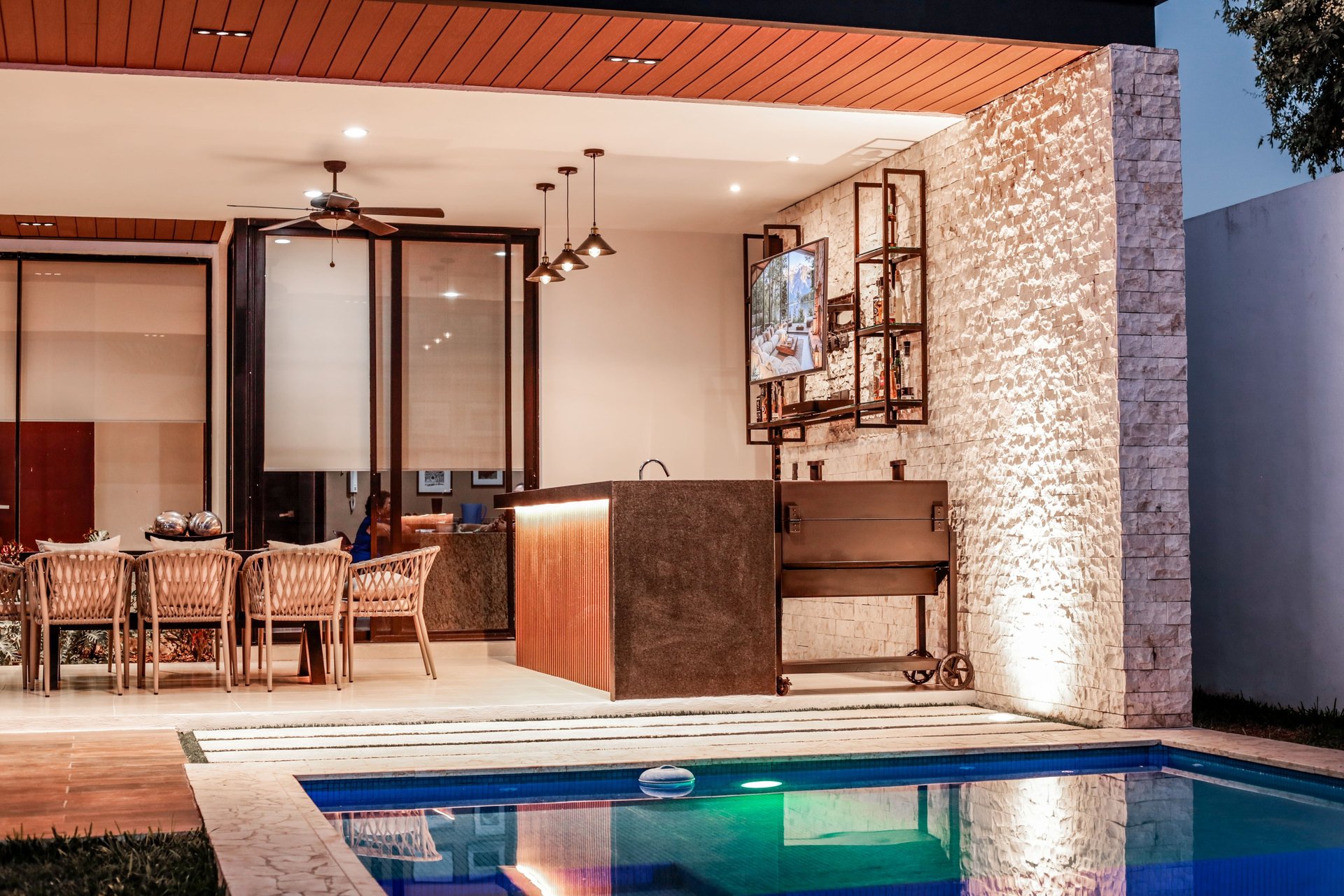 an abstract photo of a curved building with a blue sky in the background