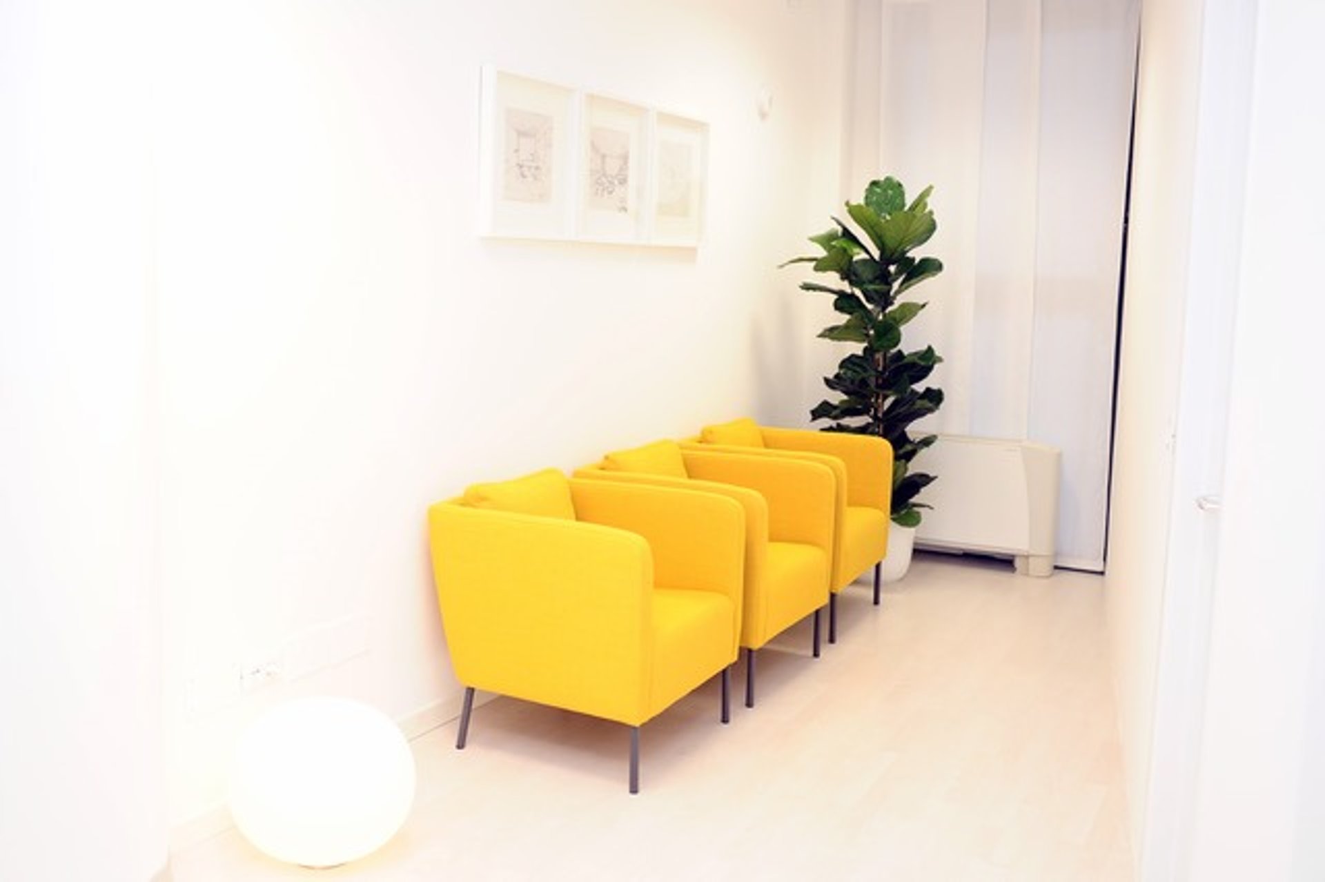 a living room filled with furniture and a flat screen tv