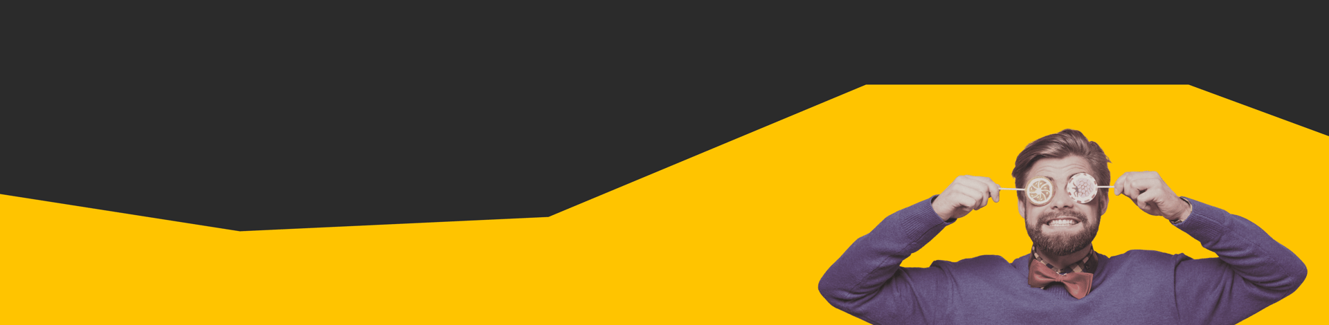 white and pink petaled flowers on metal fence near concrete houses and tower at daytime