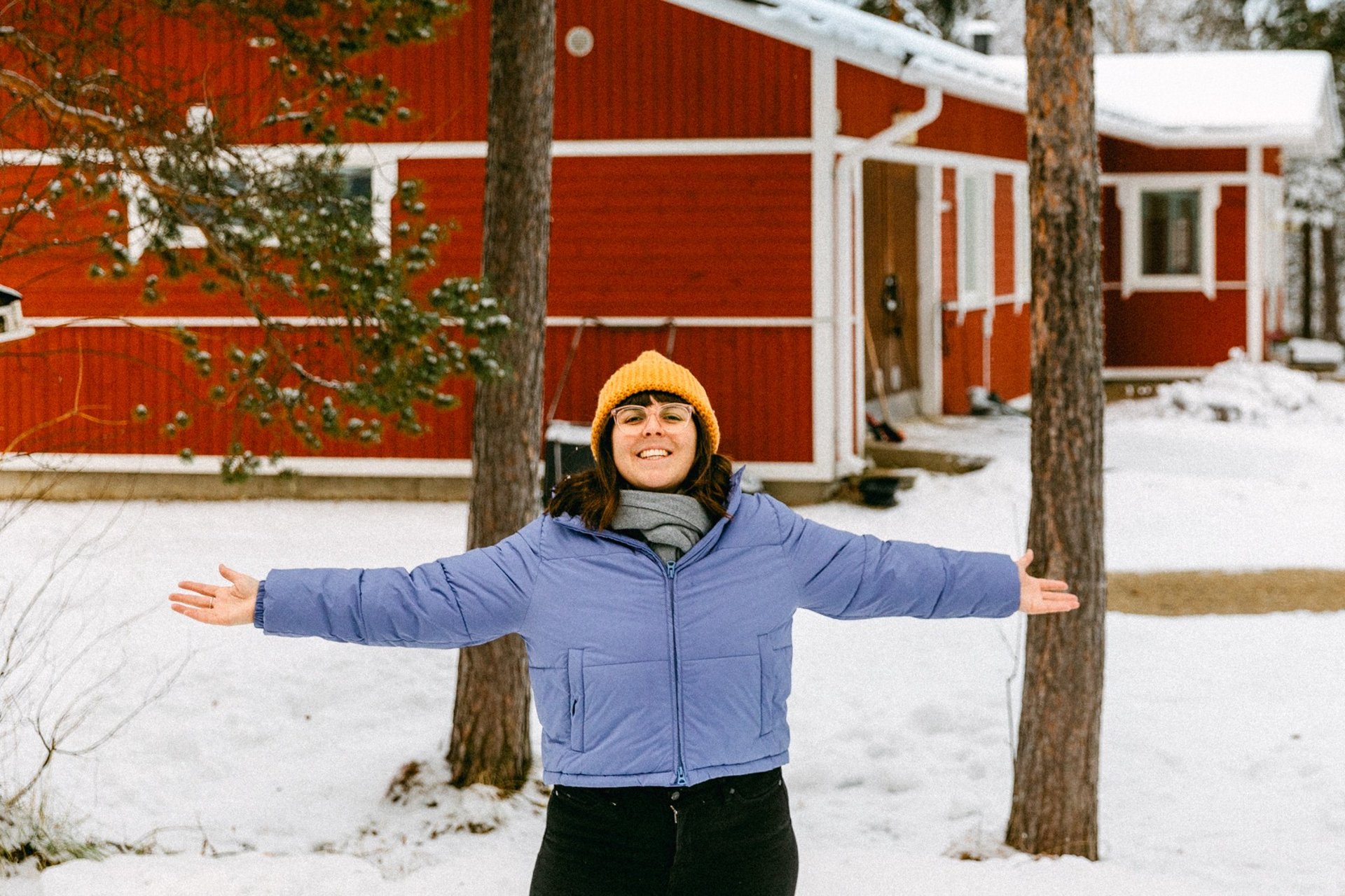 an abstract photo of a curved building with a blue sky in the background