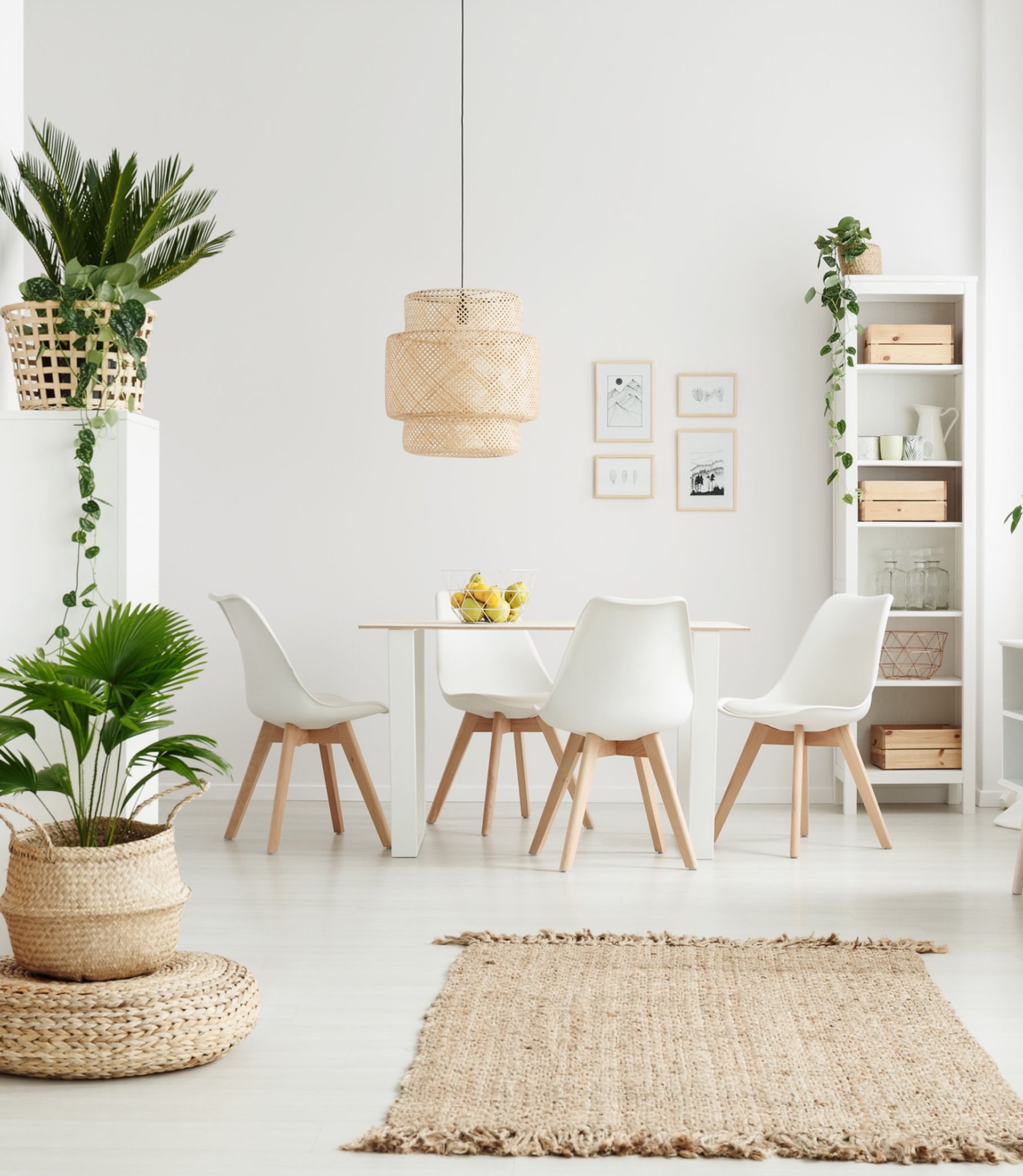 white and black throw pillow on white couch