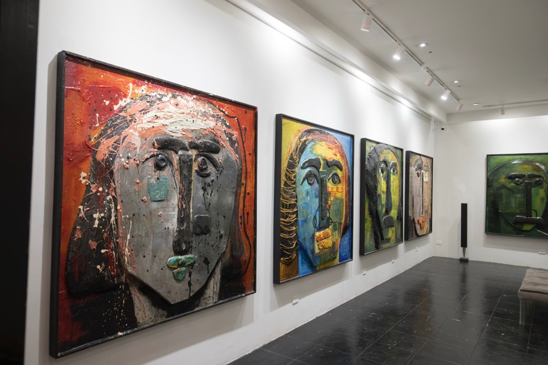 an abstract photo of a curved building with a blue sky in the background