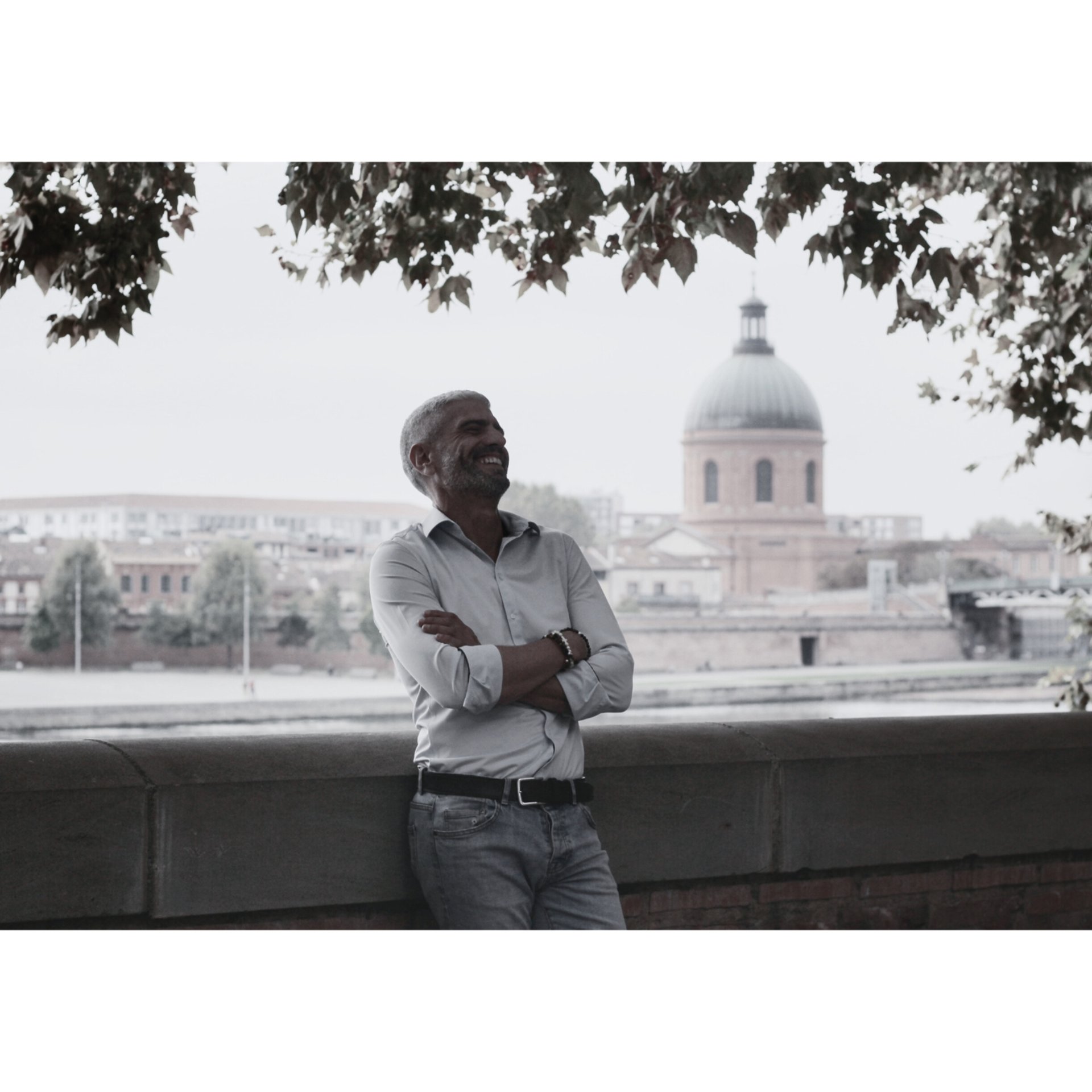 man and woman standing and touching foreheads during golden hour