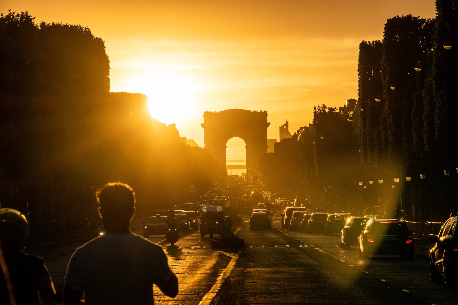 an abstract photo of a curved building with a blue sky in the background