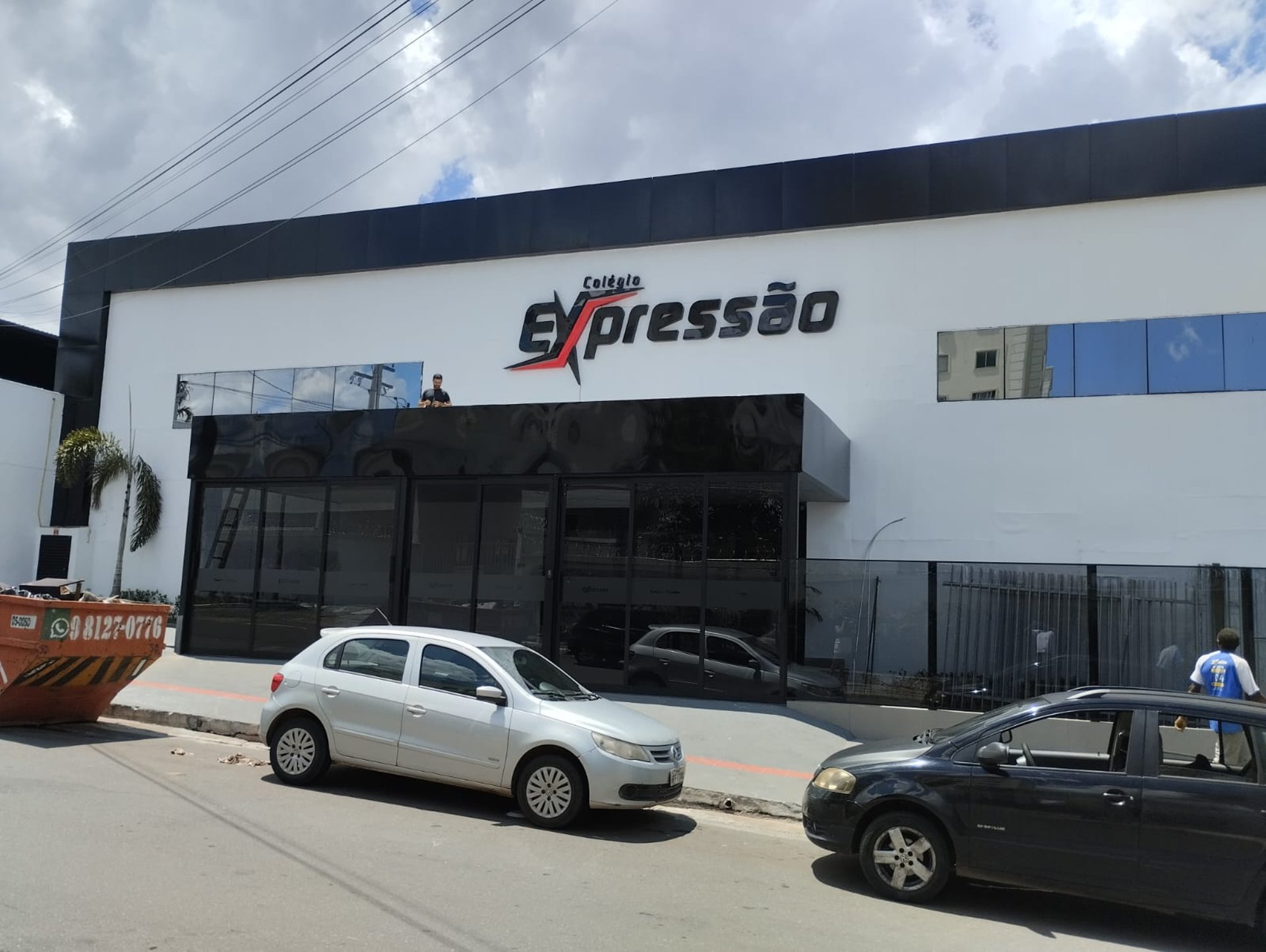 black and brown leather padded tub sofa