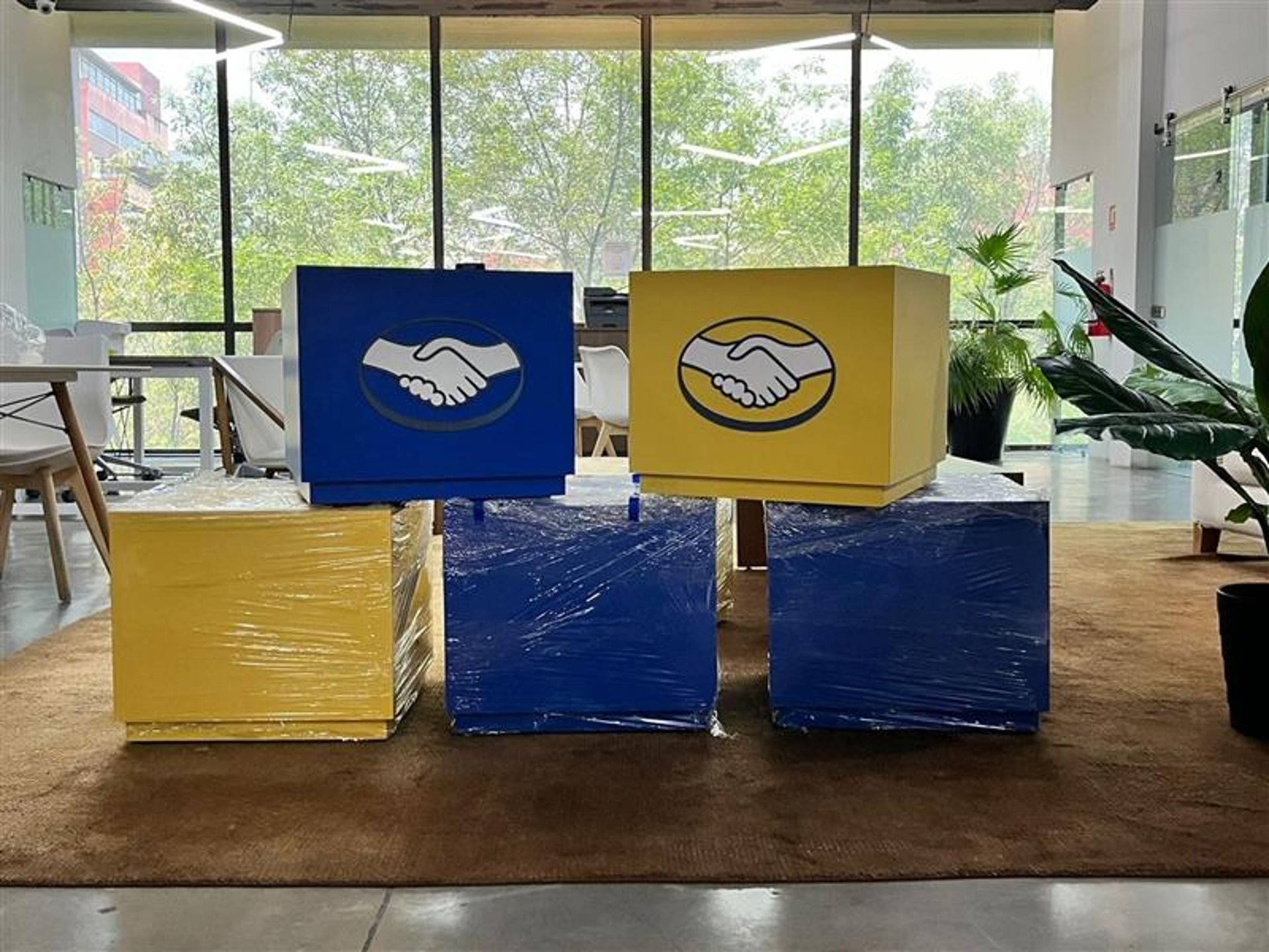 an abstract photo of a curved building with a blue sky in the background