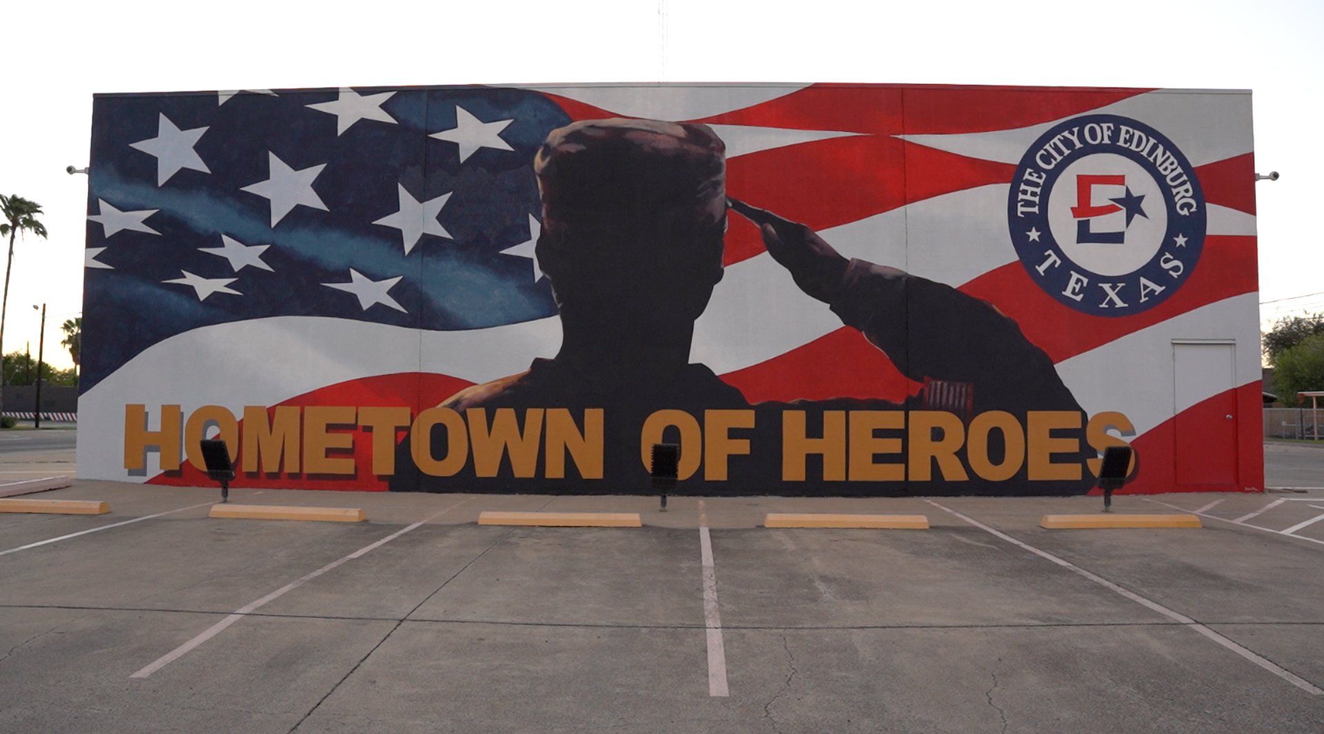 woman wearing yellow long-sleeved dress under white clouds and blue sky during daytime