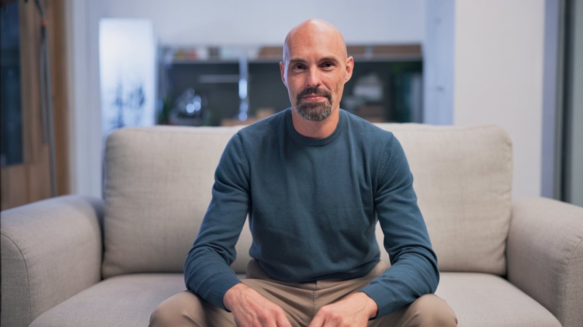 black and brown leather padded tub sofa