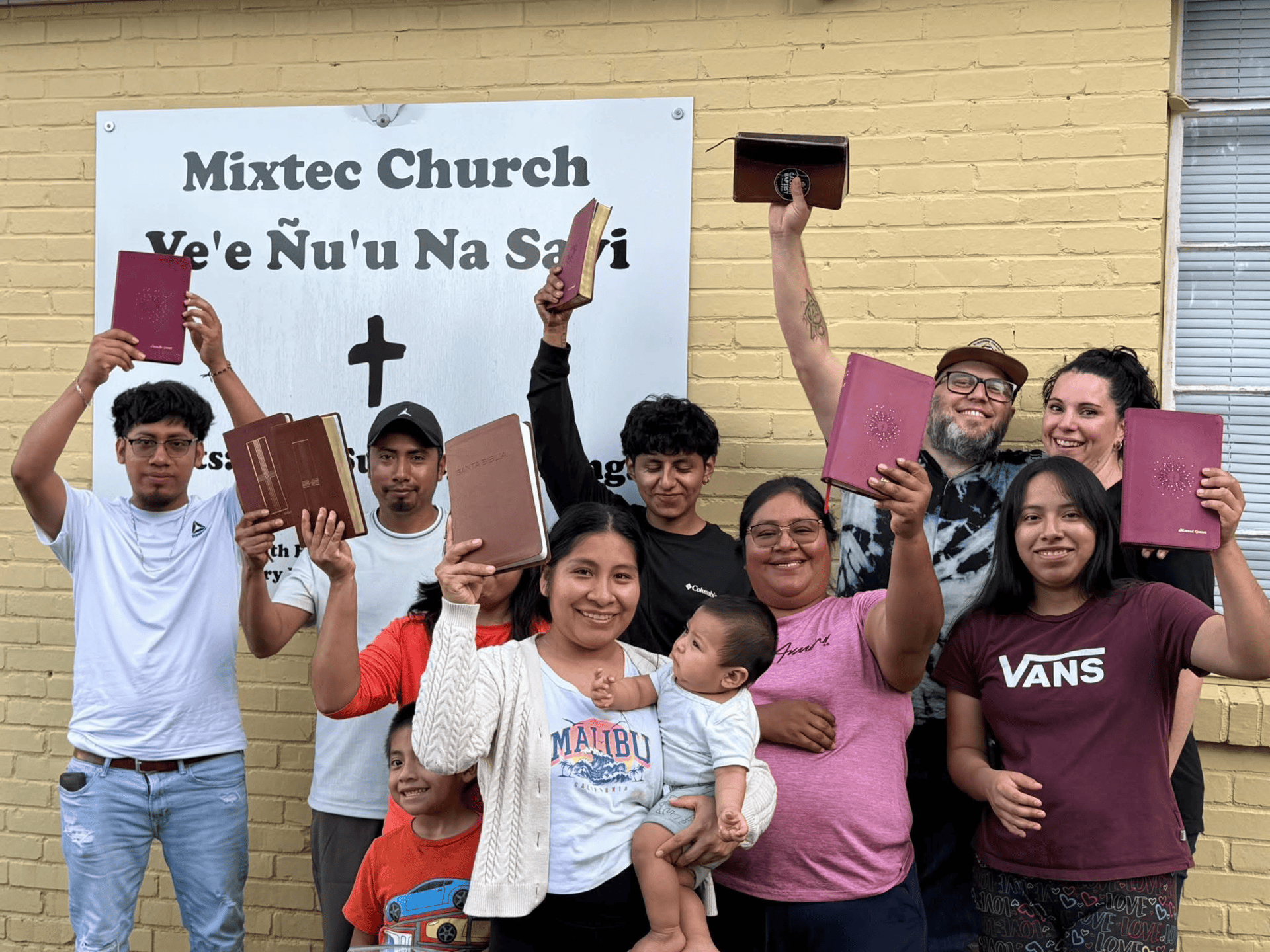 an abstract photo of a curved building with a blue sky in the background