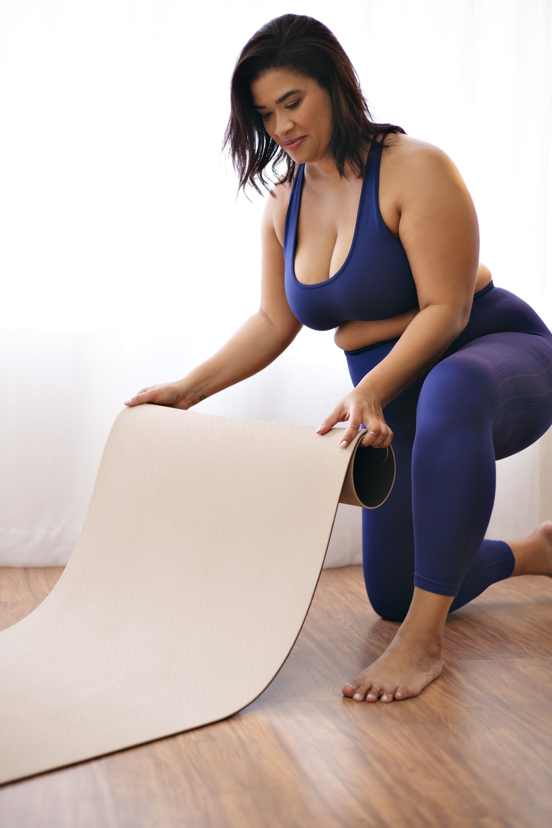 black and brown leather padded tub sofa