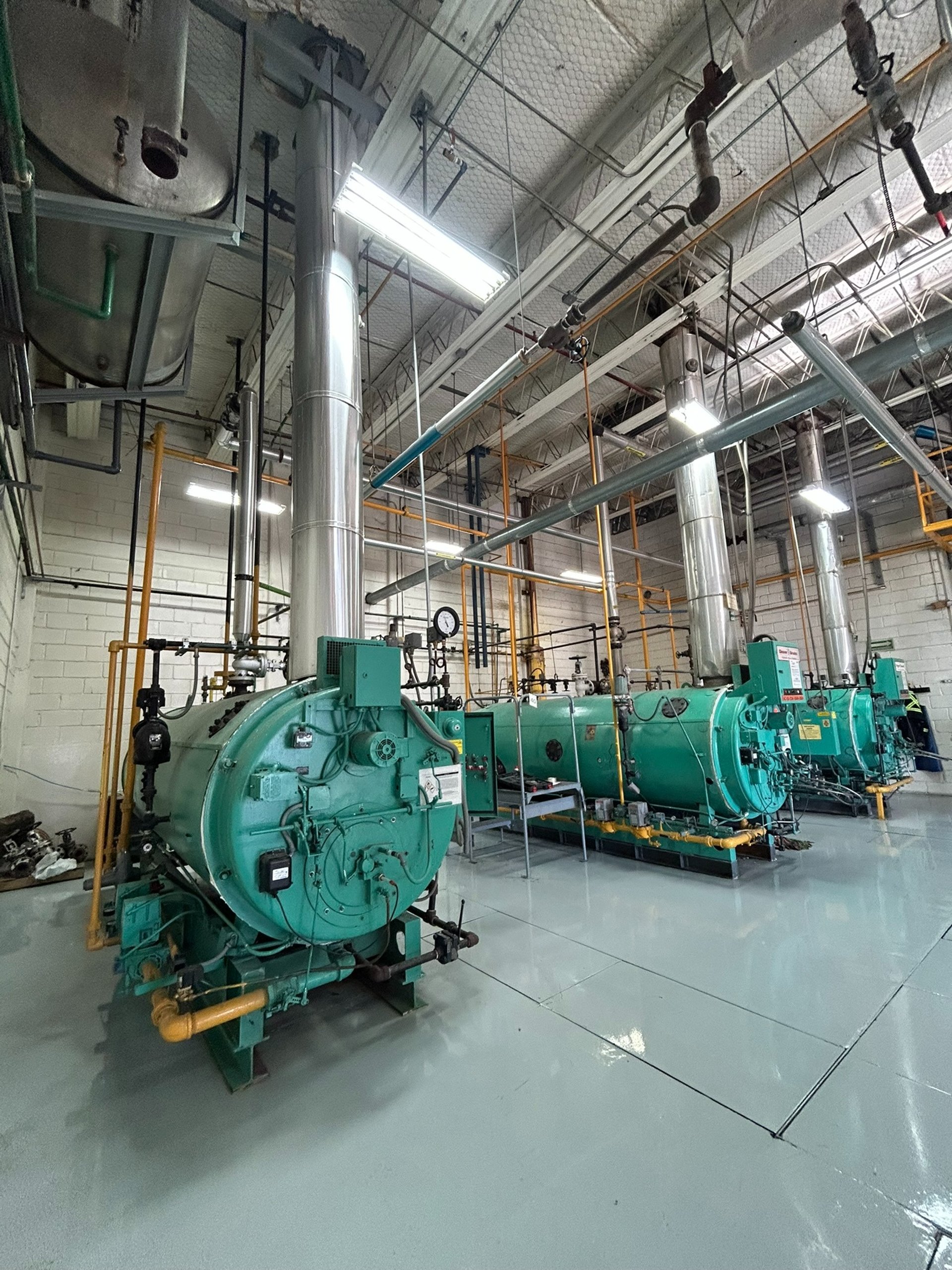 man wearing automatic dark welding helmet
