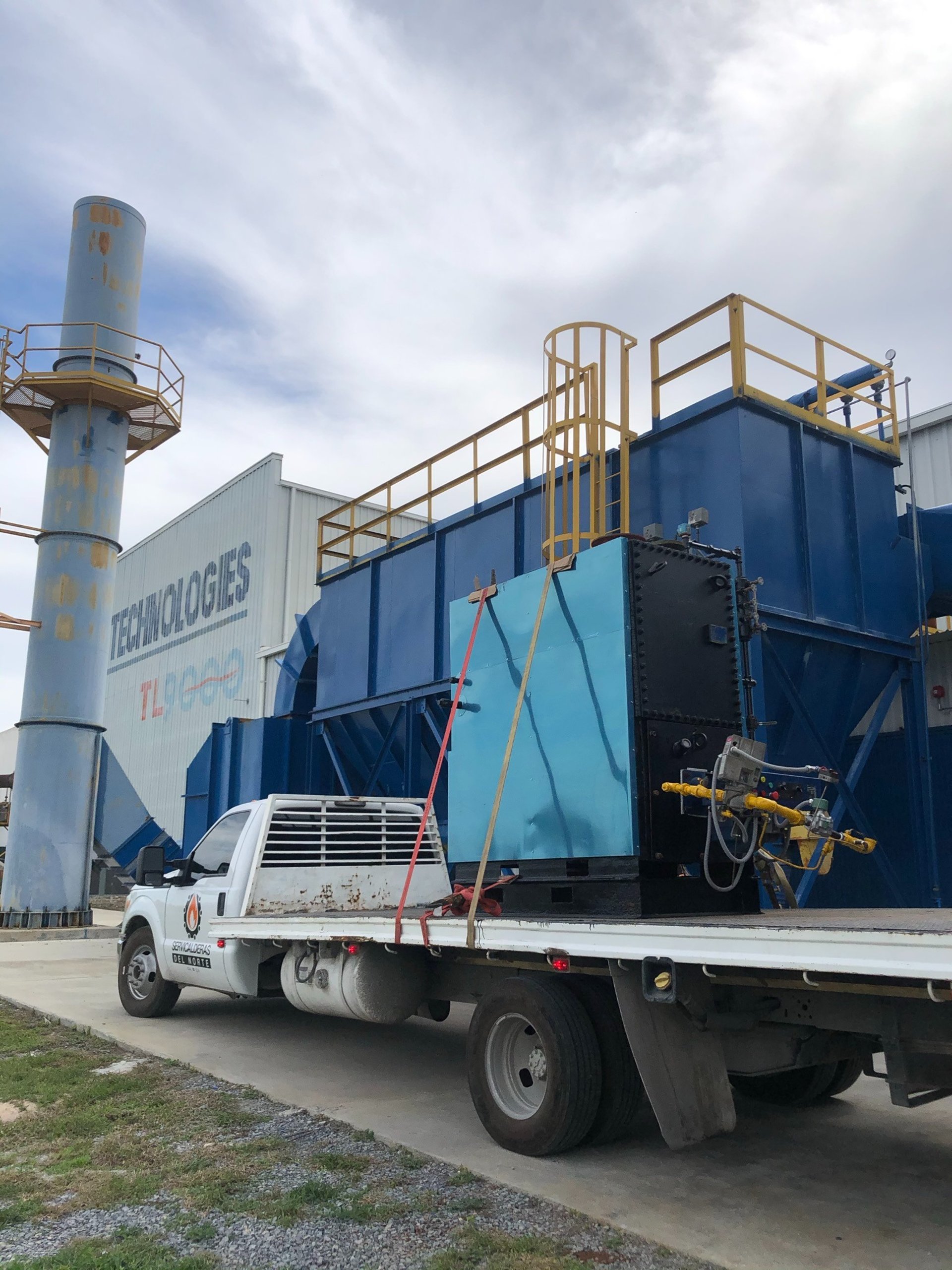 man wearing automatic dark welding helmet