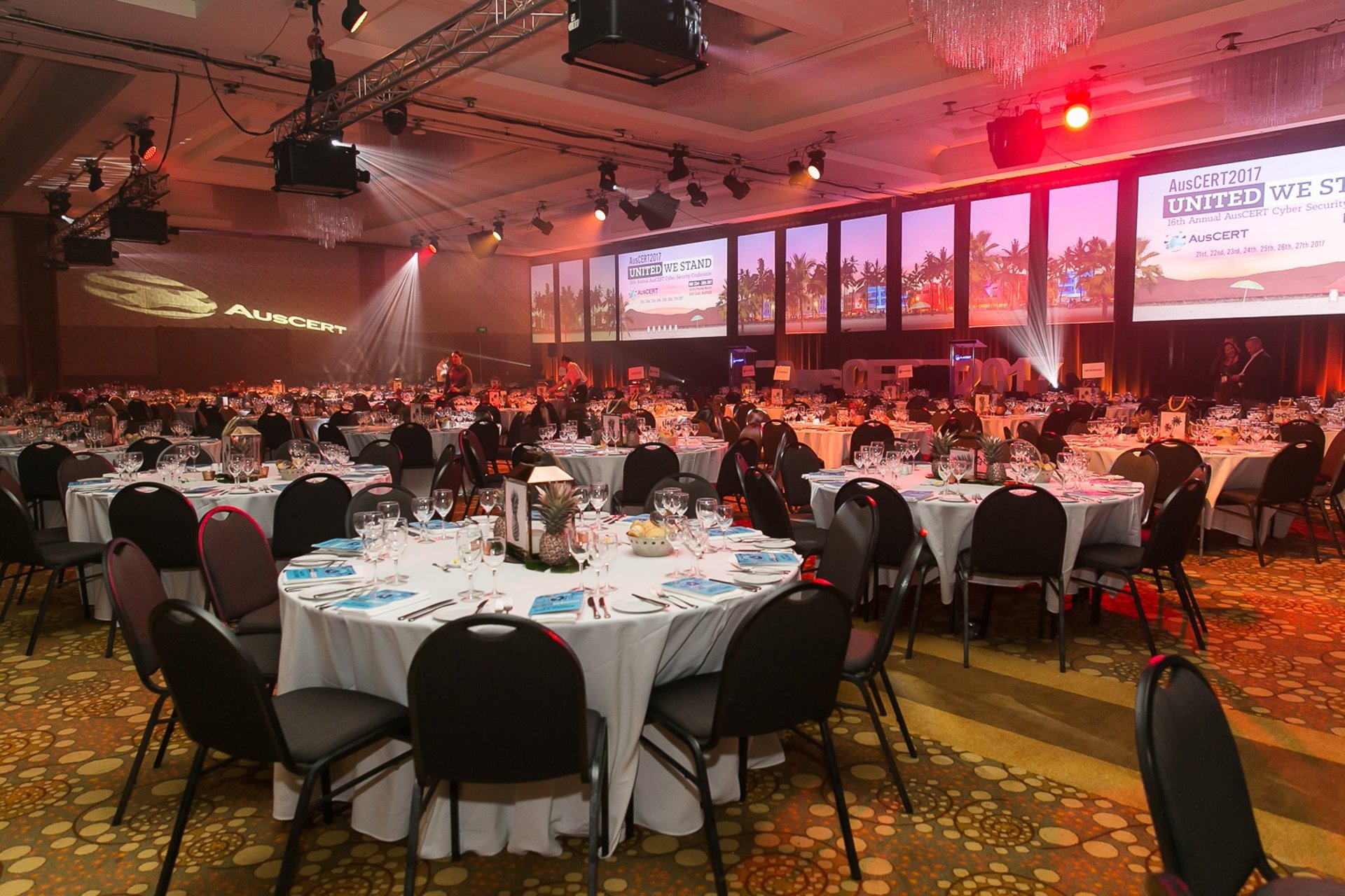 an abstract photo of a curved building with a blue sky in the background