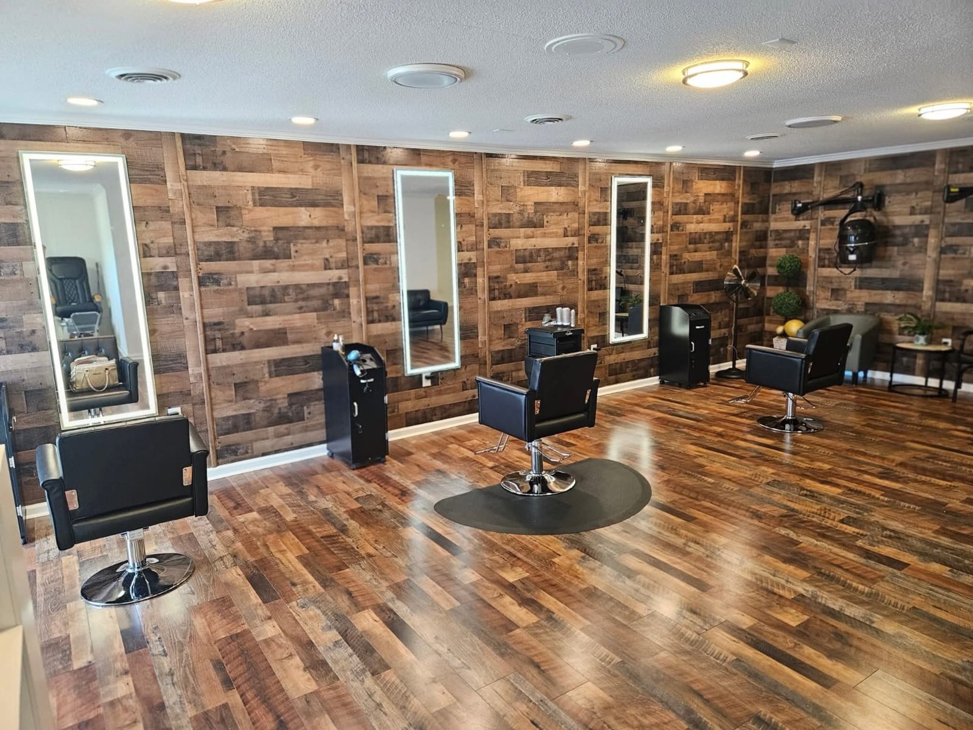 black and brown leather padded tub sofa