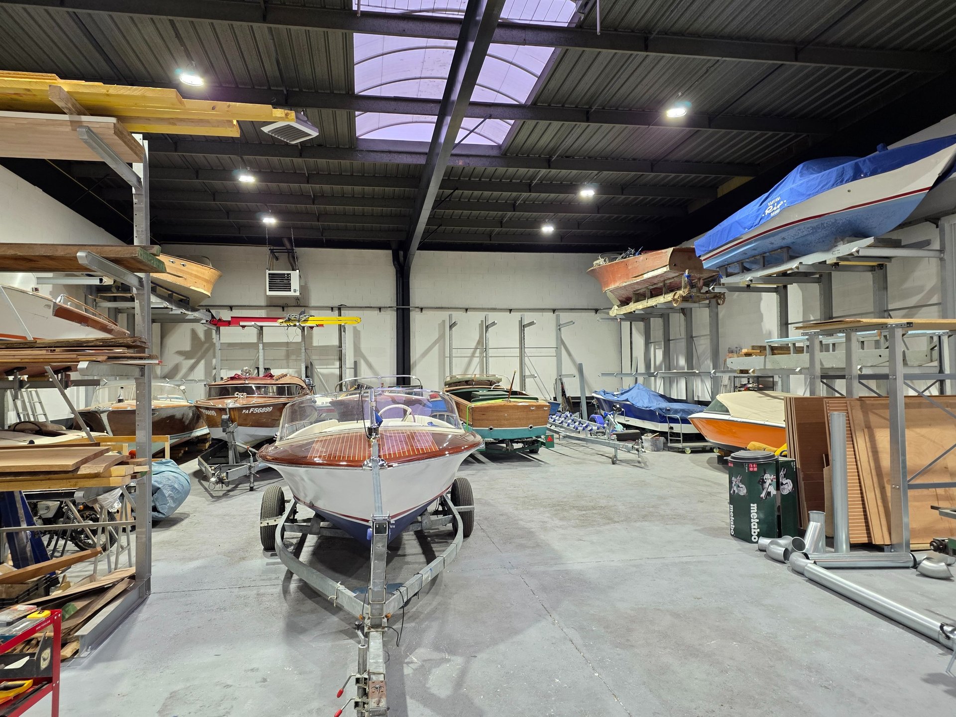 black and brown leather padded tub sofa