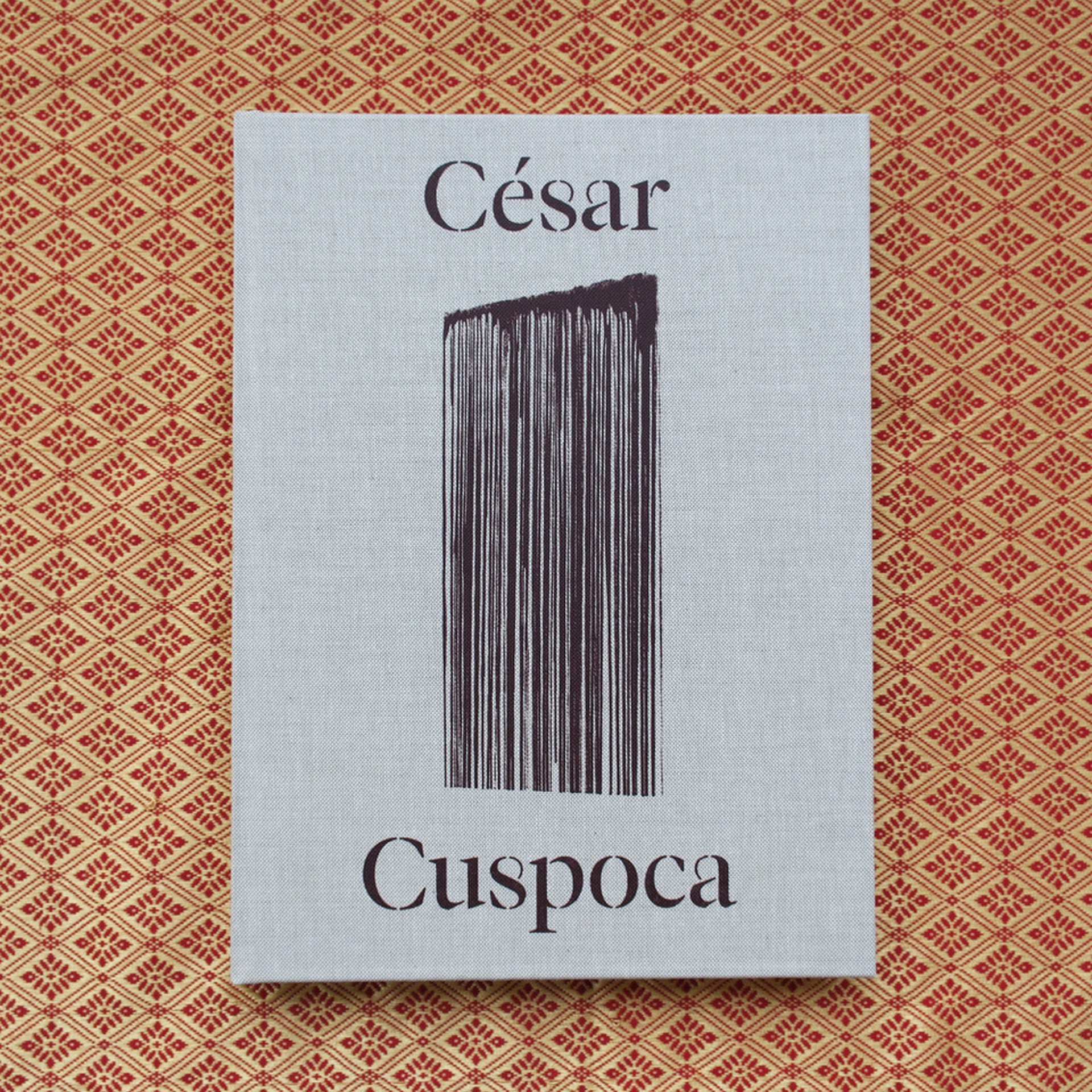 an abstract photo of a curved building with a blue sky in the background