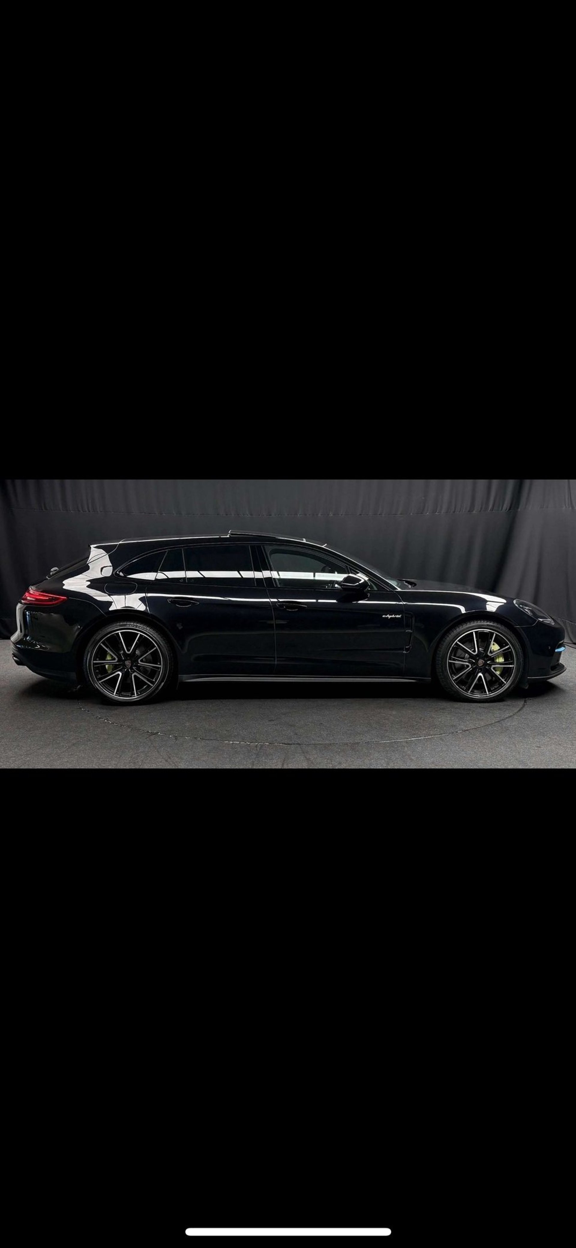 black and brown leather padded tub sofa