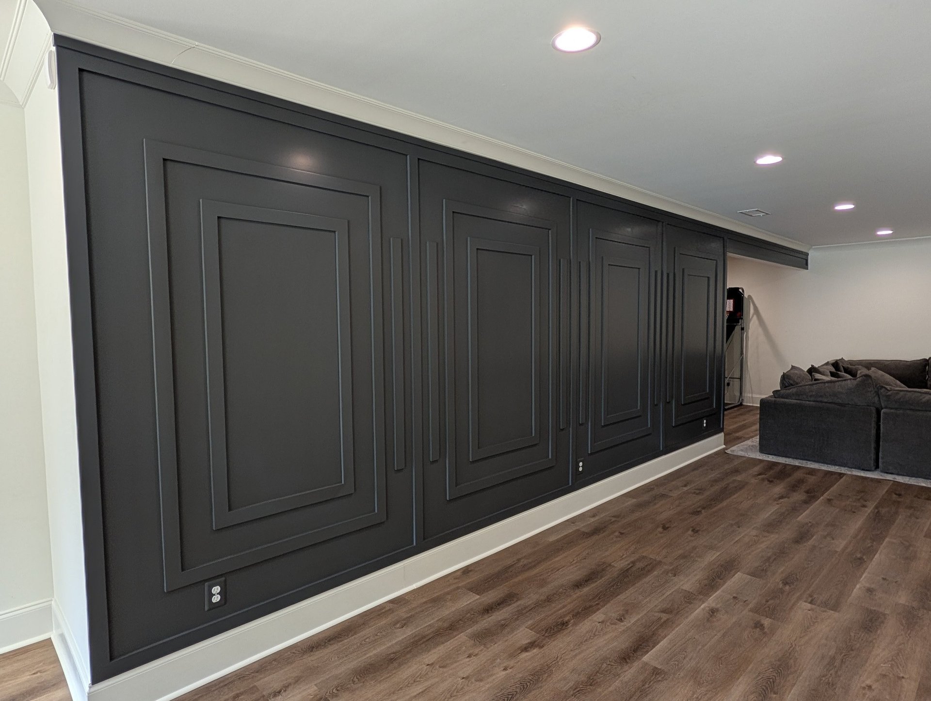 black and brown leather padded tub sofa