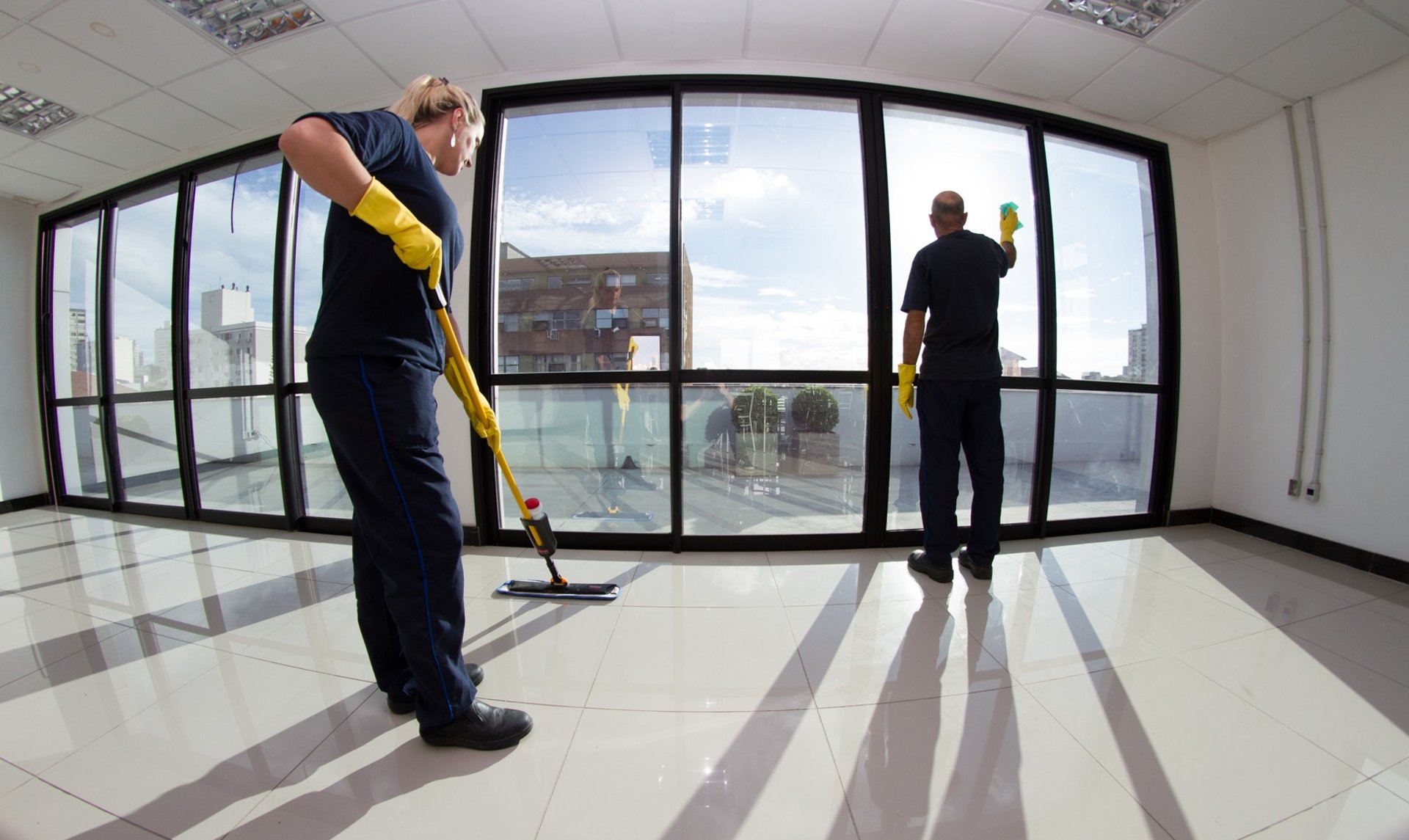 an abstract photo of a curved building with a blue sky in the background