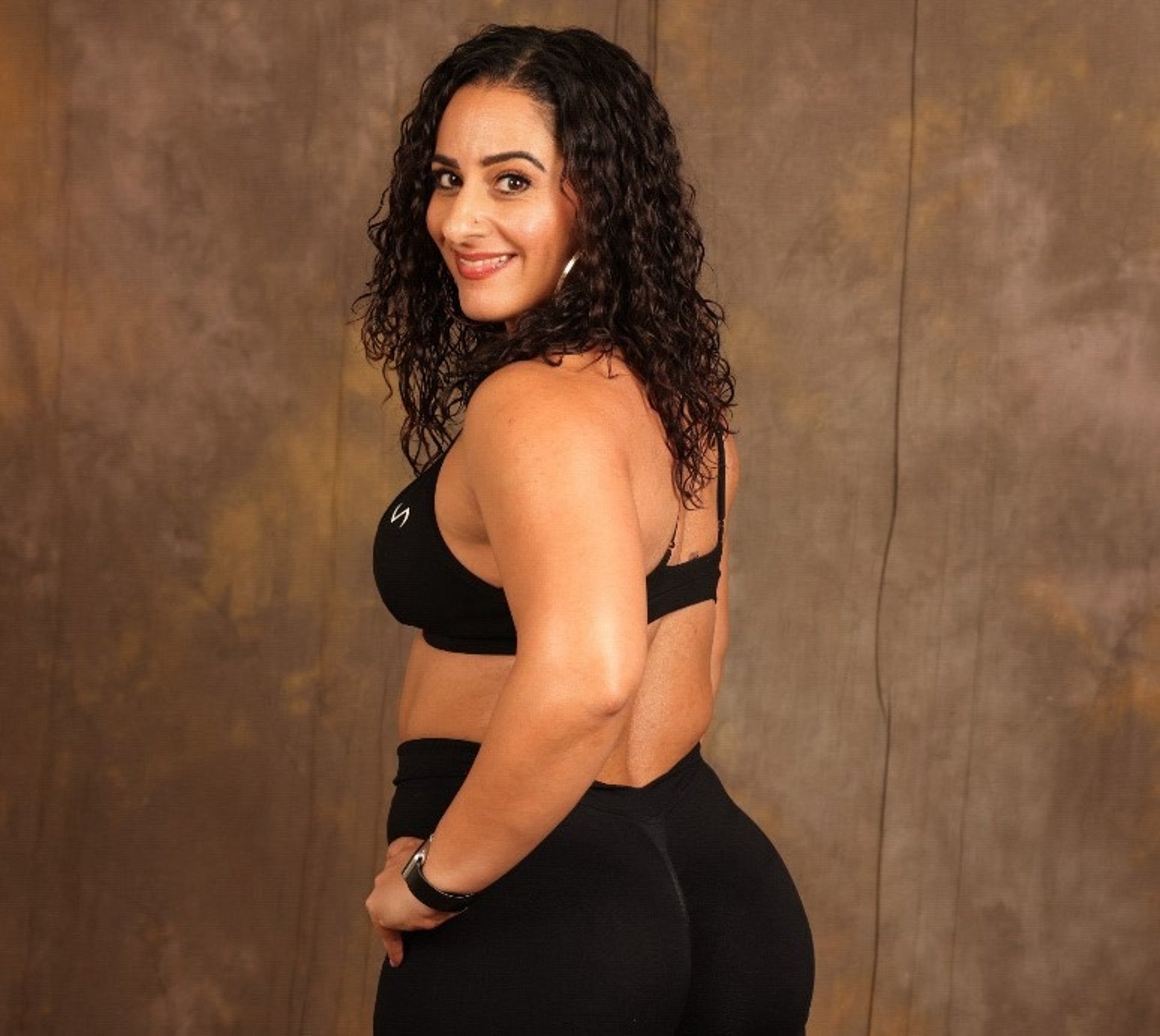 black and brown leather padded tub sofa